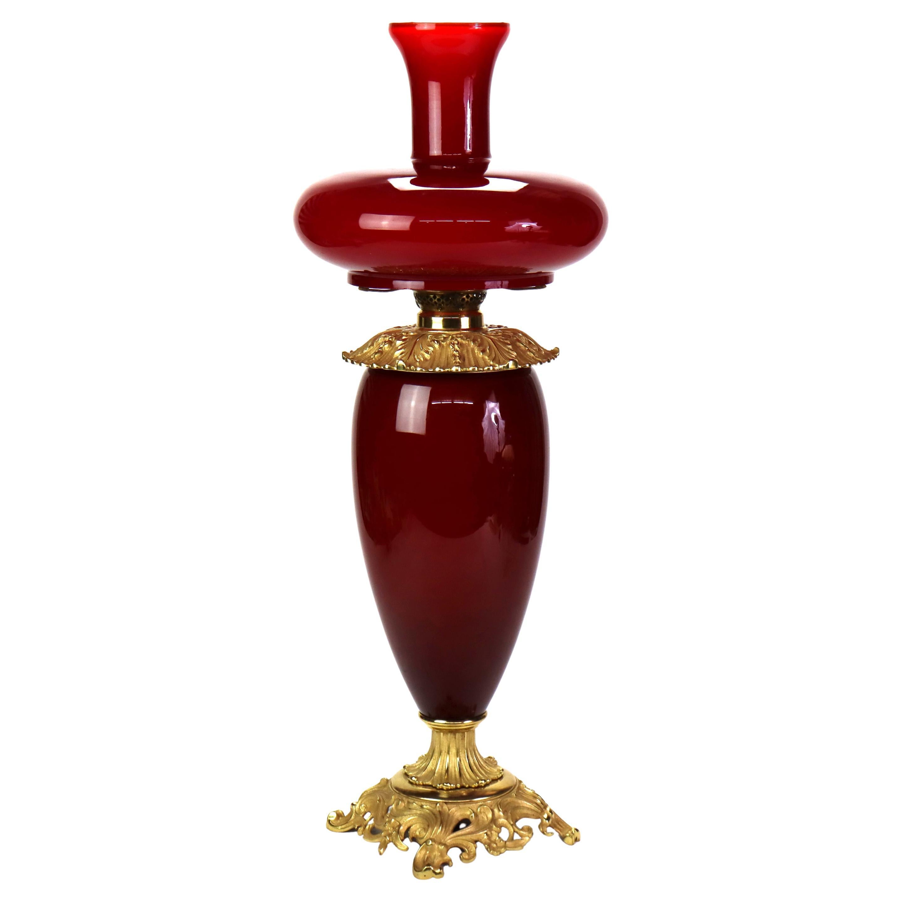 Antiguo E.M. & Co. Apolo Lámpara de aceite de cristal rojo de Lo que el viento se llevó c1900 en venta