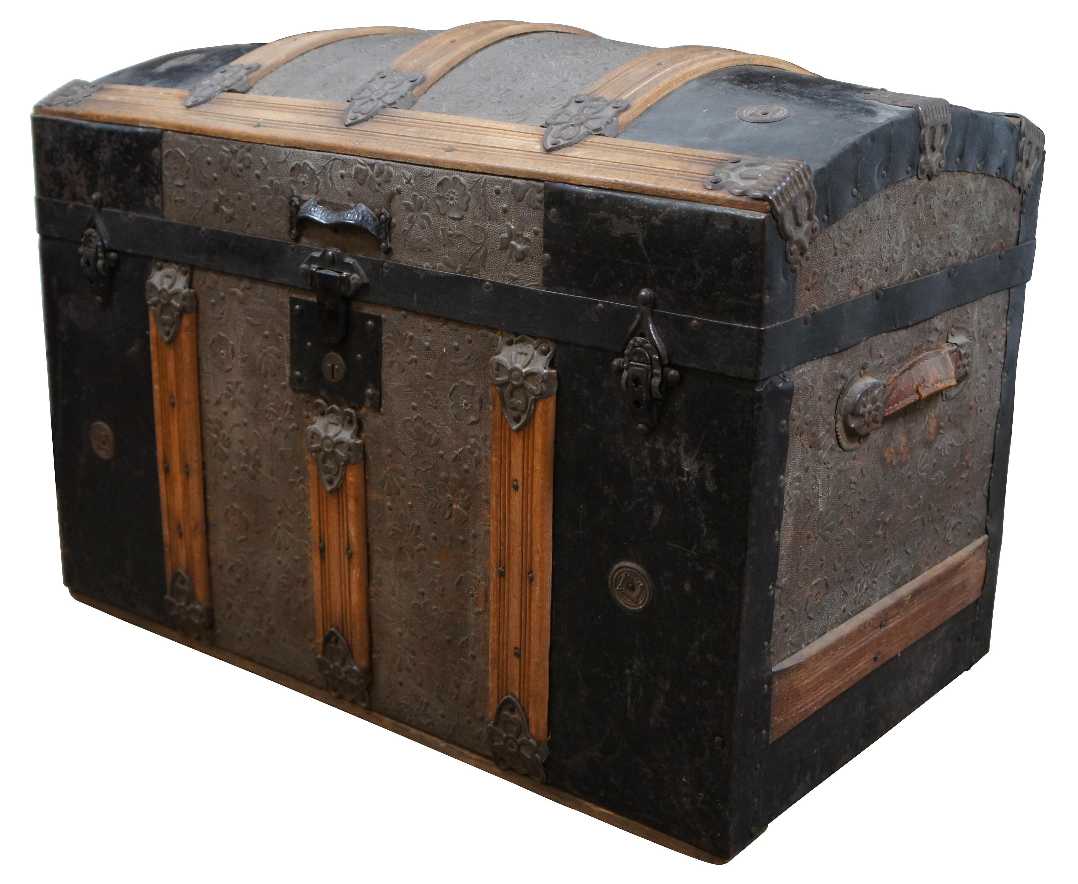 antique steamer trunk with picture inside