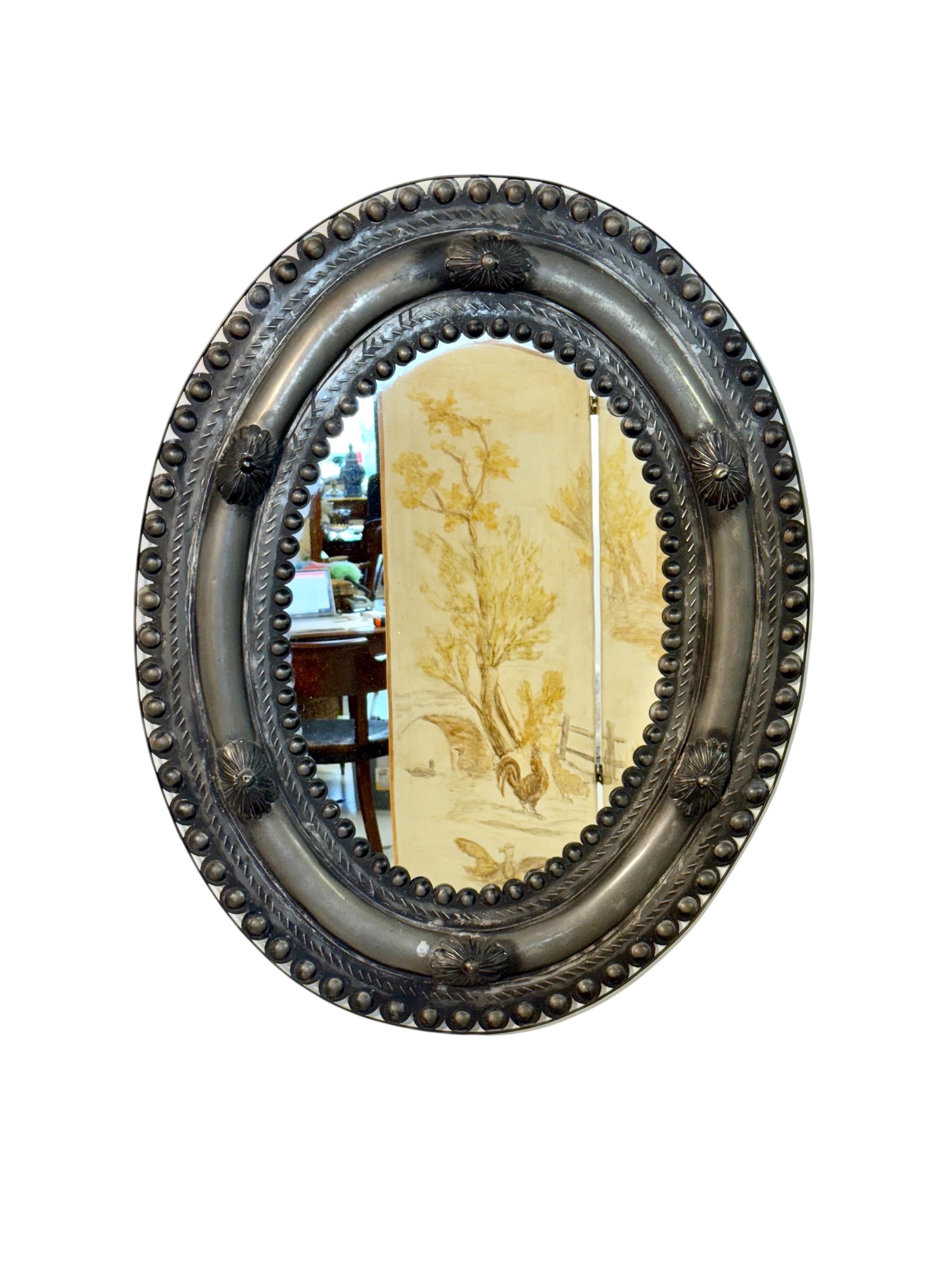 Antique Embossed Metal Oval Mirror with Cabochons and Rosettes For Sale 11