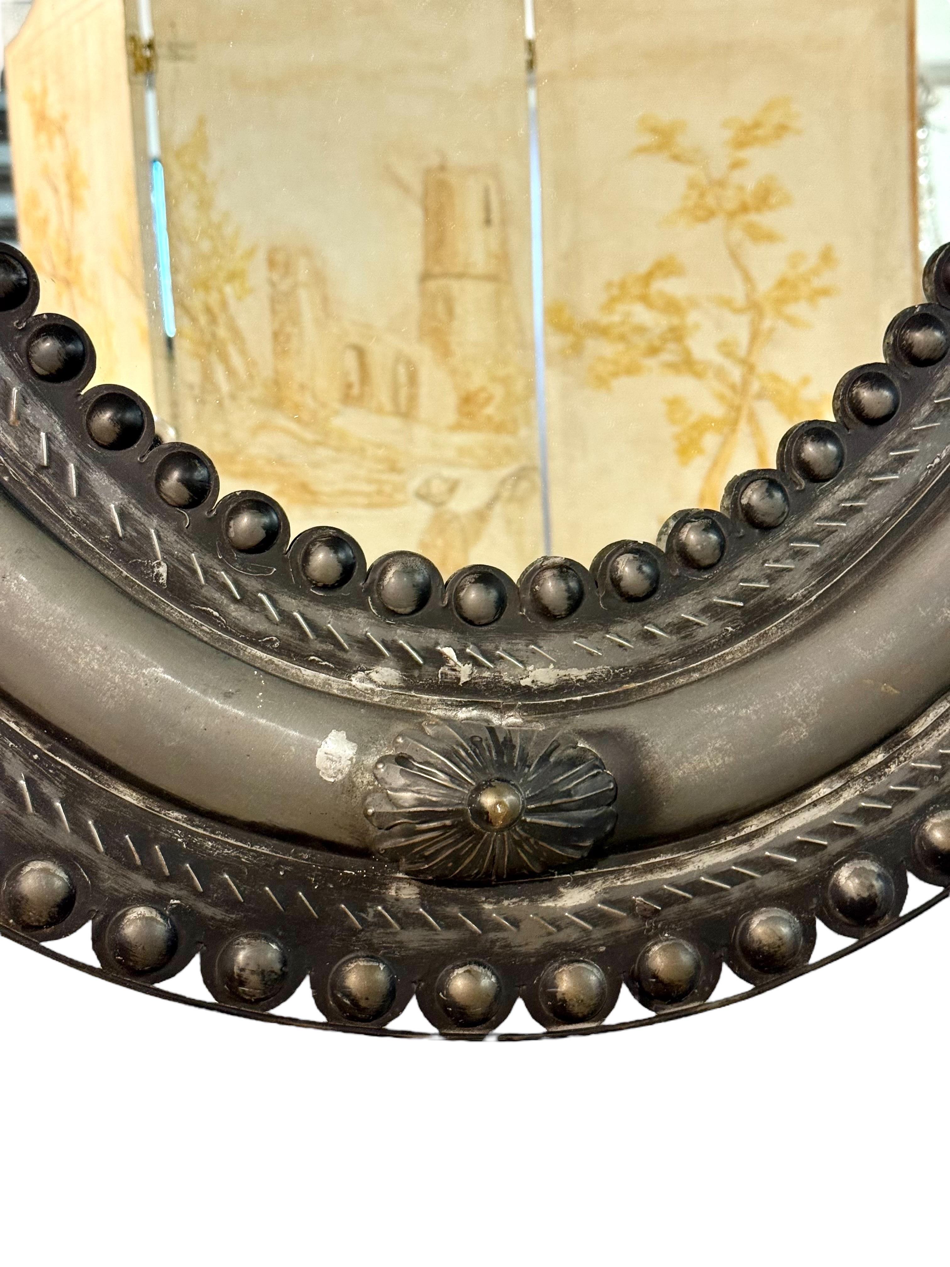 20th Century Antique Embossed Metal Oval Mirror with Cabochons and Rosettes For Sale