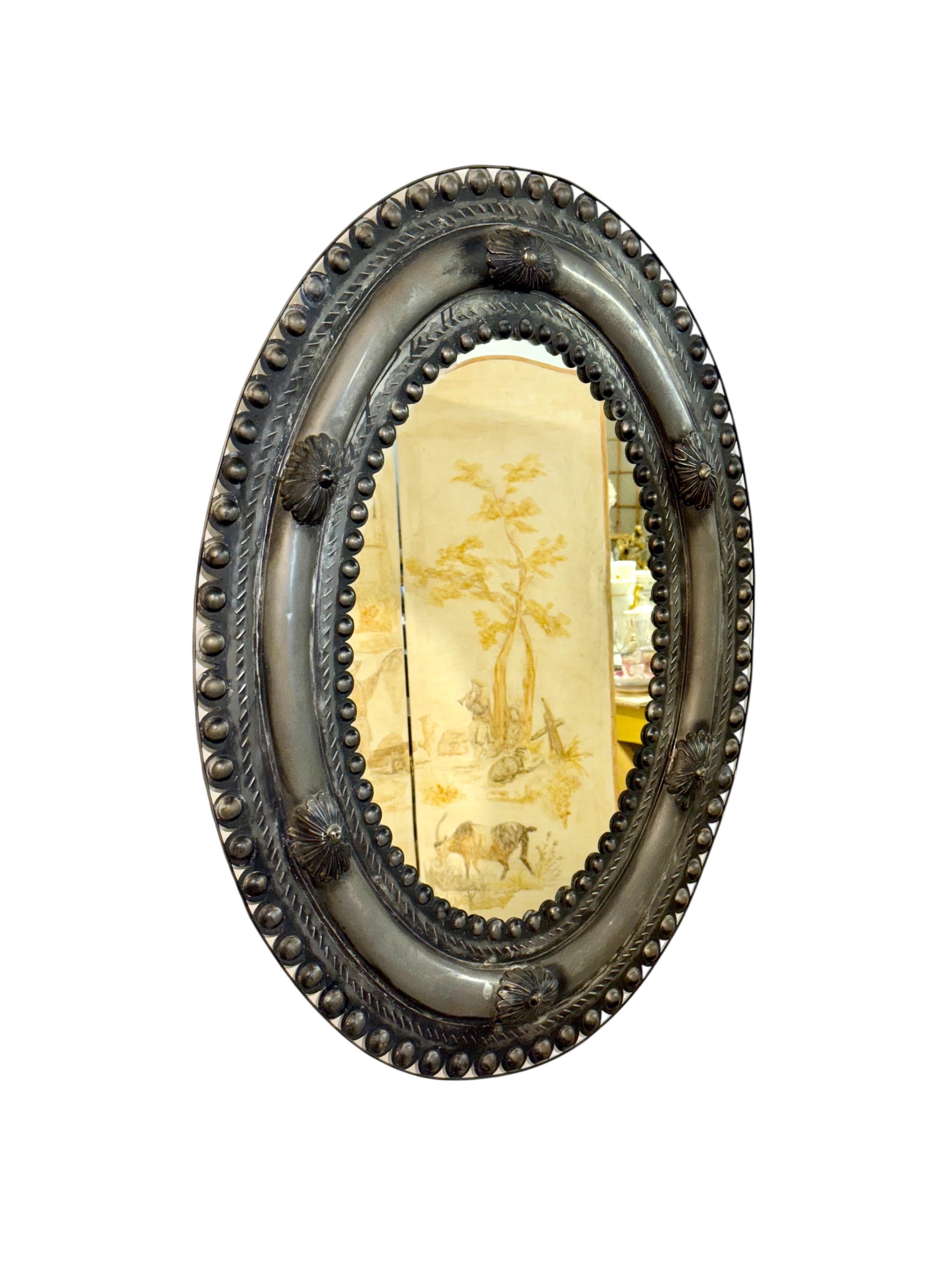 Antique Embossed Metal Oval Mirror with Cabochons and Rosettes For Sale 1