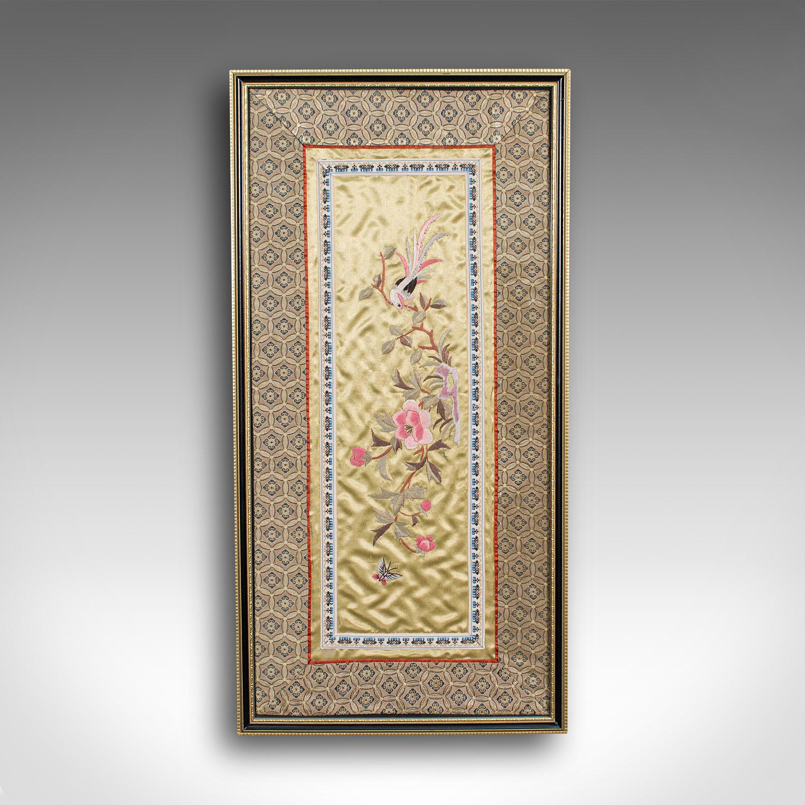 This is an antique embroidered silk panel. A Chinese, framed decorative needlepoint tapestry, dating to the late 19th century, circa 1900.

Eye-catching oriental display panel
Presenting a desirable aged patina
Golden silk cotton ground with