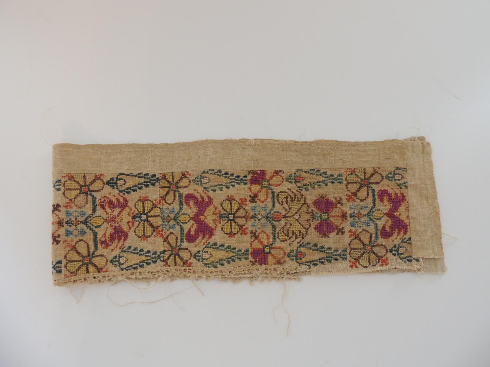 Antique embroidered Turkish textile fragment.
Floral pattern embroidery silk threads on linen.
In shades of red, orange, green, blue, brown and purple.
Ideal to use on the center of a pillow or upholstery.
Size: 31