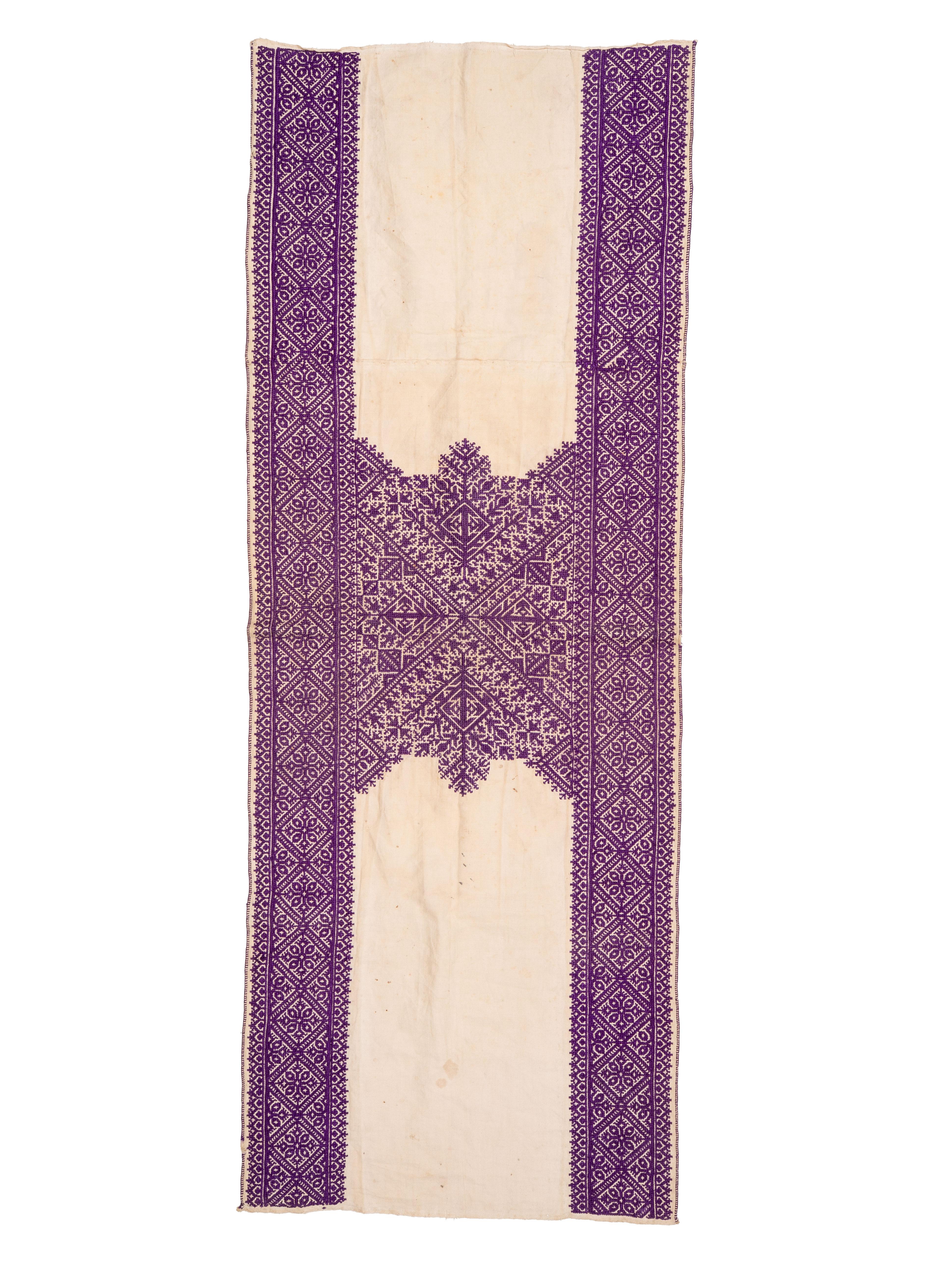 Fez embroidery was among the most sophisticated textile arts of Morocco, practiced by women in domestic settings and highly prized as part of marriage furnishings. The geometric patterning resonates with Andalusian and Islamic artistic traditions,