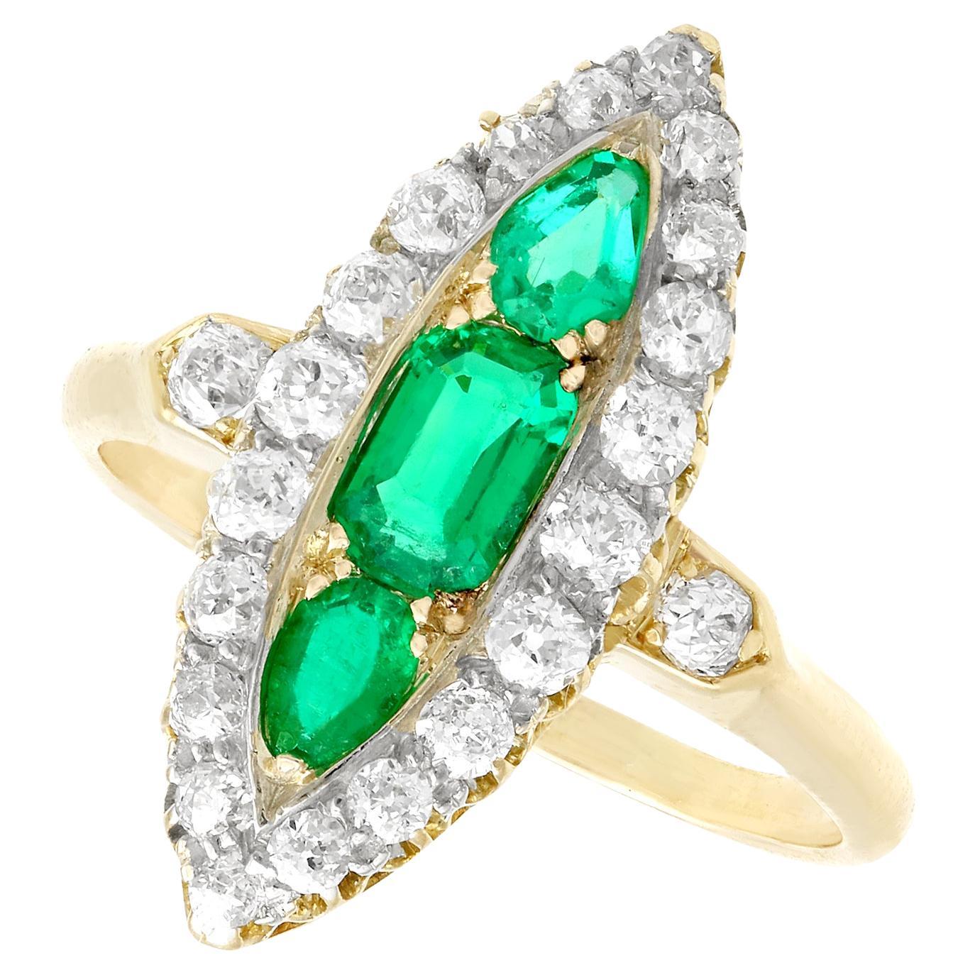 Antique Emerald and 1.38Ct Diamond Yellow Gold Marquise Shaped Ring For Sale