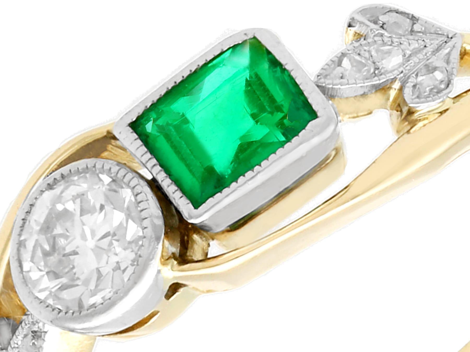 Emerald Cut Antique Emerald and Diamond 14K Yellow Gold Twist Ring, Circa 1920 For Sale