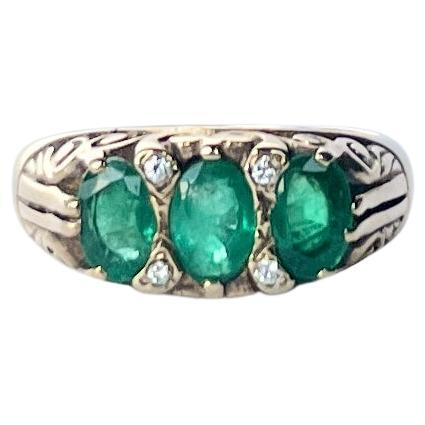 Antique Emerald and Diamond 18 Carat Gold Three-Stone Ring For Sale