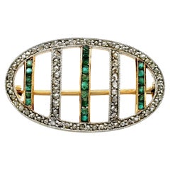 antique emerland brooches Antique Emerald and Diamond Oval Brooch in Yellow Gold
