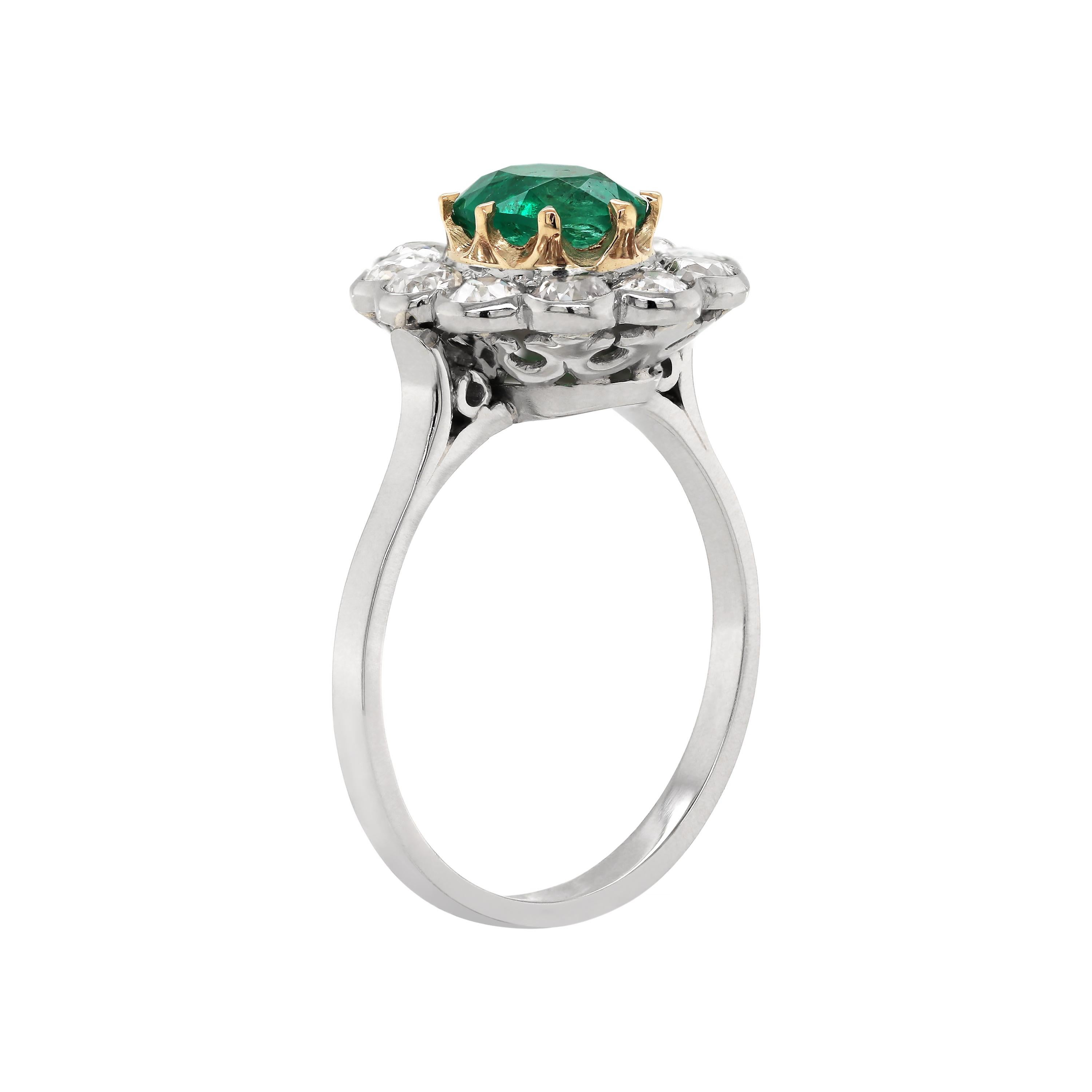 Edwardian Antique Emerald and Diamond Platinum Coronet Cluster Ring, circa 1920s