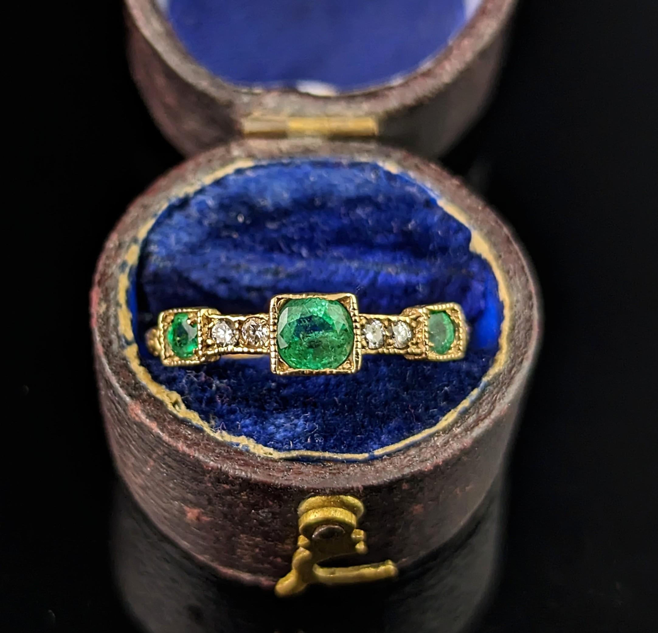 Such a beautiful antique Emerald and Diamond ring!

This one absolutely shines with rich character and wonderfully intense colours that work so well together to truly bring everything together in a delicate yet regal way.

It is crafted in rich 15ct