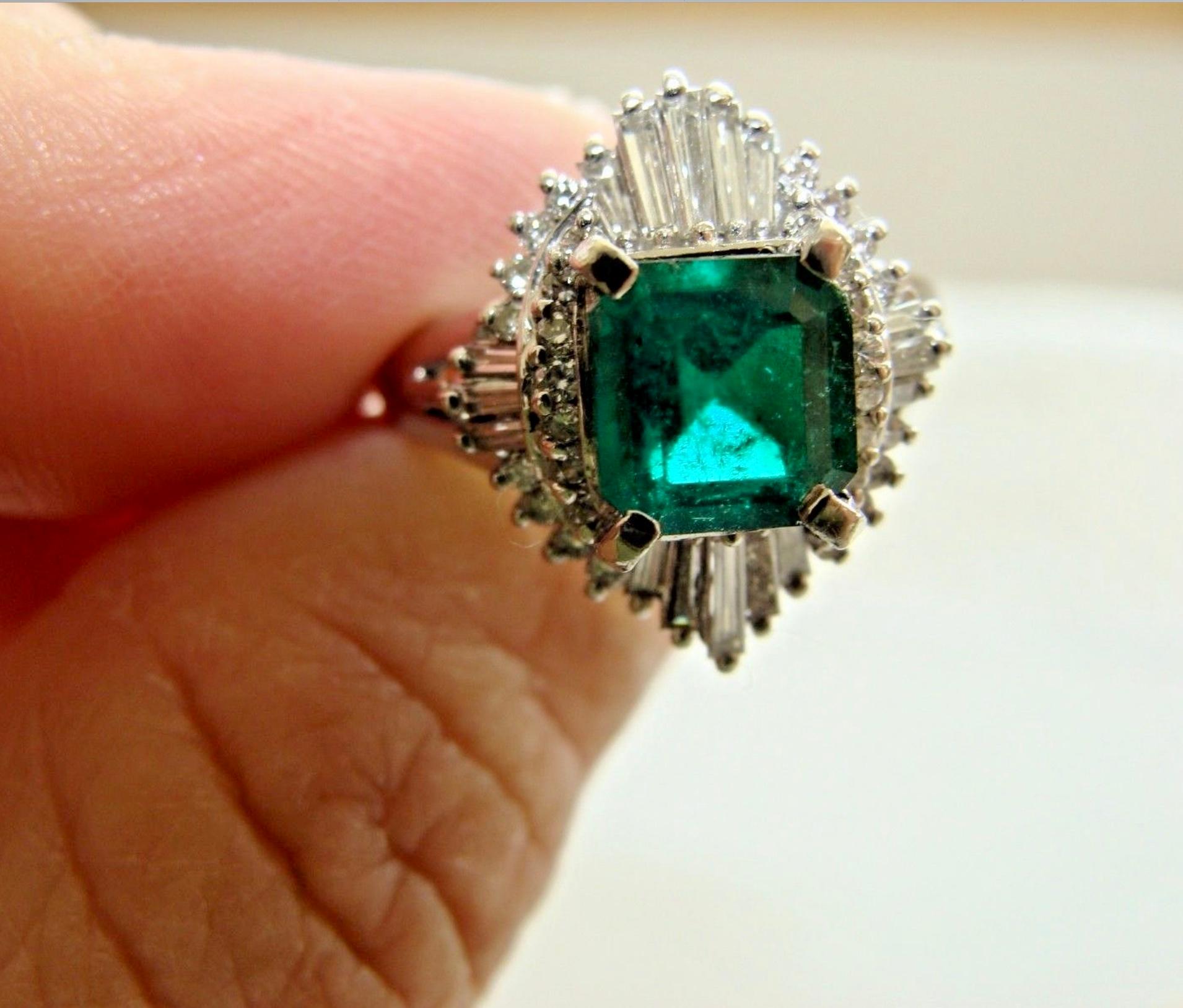 This most interesting statement ring would make an awesome alternative engagement ring, too. A wonderful heirloom. The emerald color is more beautiful than in the picture, AAA deep forest green Colombian emerald emerald cut with minor inclusions