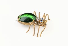 Antique Emerald green paste spider brooch