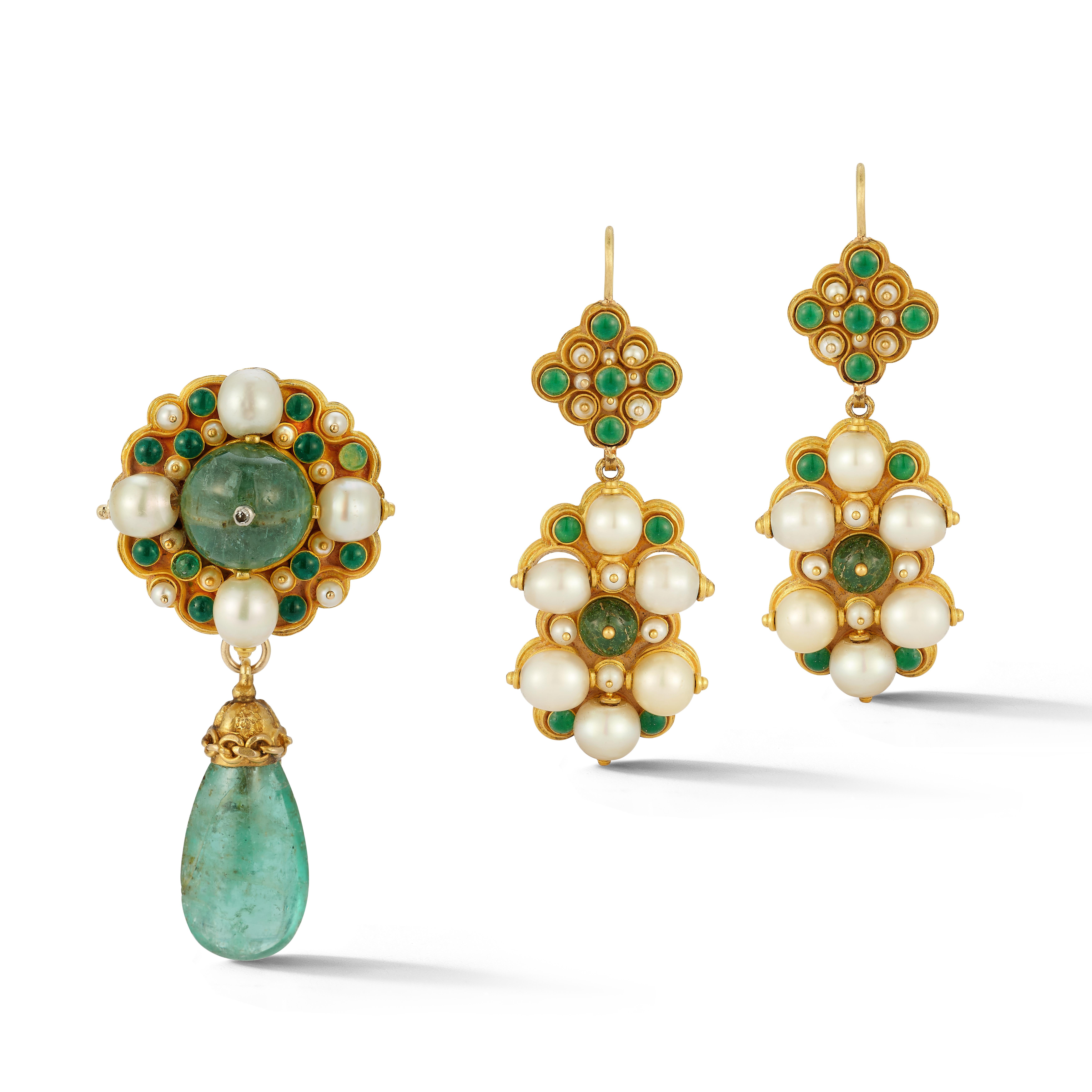Antique Emerald Pearl and Enamel Brooch & Earrings Set

Circa 1907

A set of antique enamel earrings and brooch consisting of pearls and emeralds set in gold

Earrings Length: 2.25