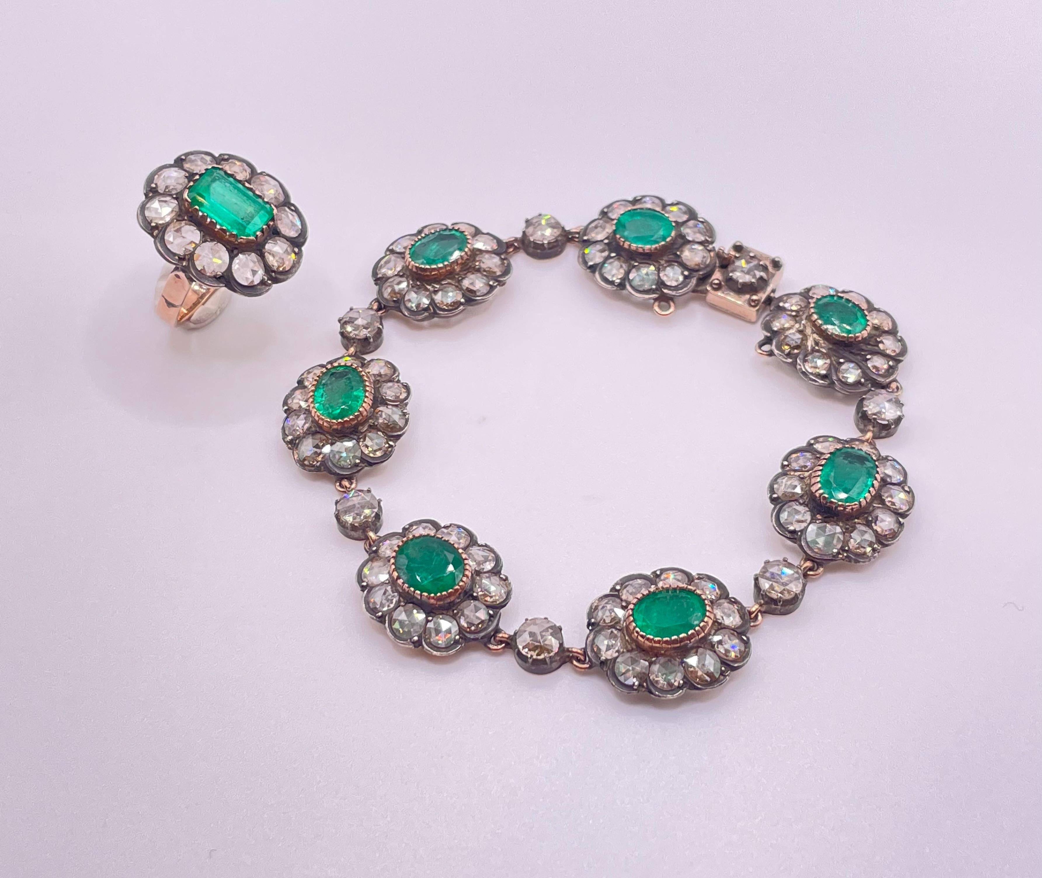 spectacular antique bracelet and ring cast in 14 karat gold and silver ,this set has approximately 8.00 carat emerald , 6.00 carat rose-cut diamond .


