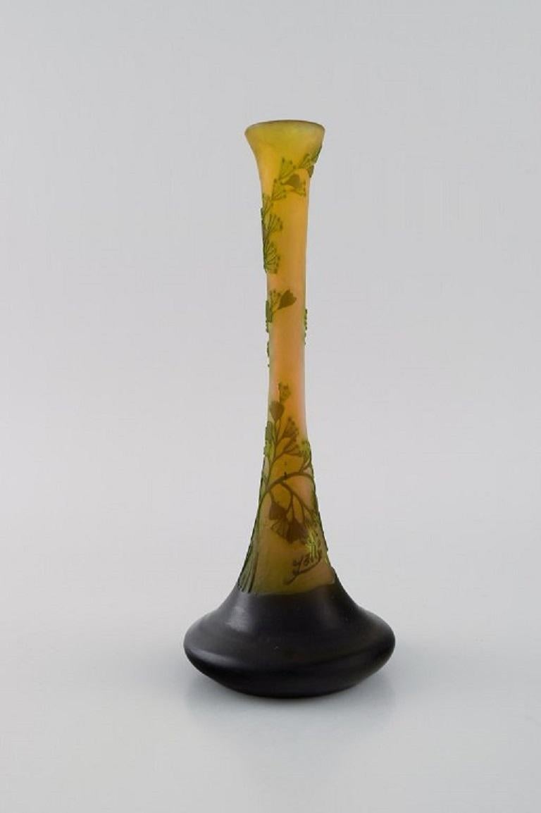 Antique Emile Gallé vase in yellow frosted and green art glass carved in the form of flowers and foliage. 
Early 20th century.
Measures: 21.5 x 8.8 cm.
In excellent condition.
Signed.