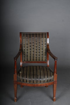 Fauteuil Empire ancien, en acajou, vers 1890.
