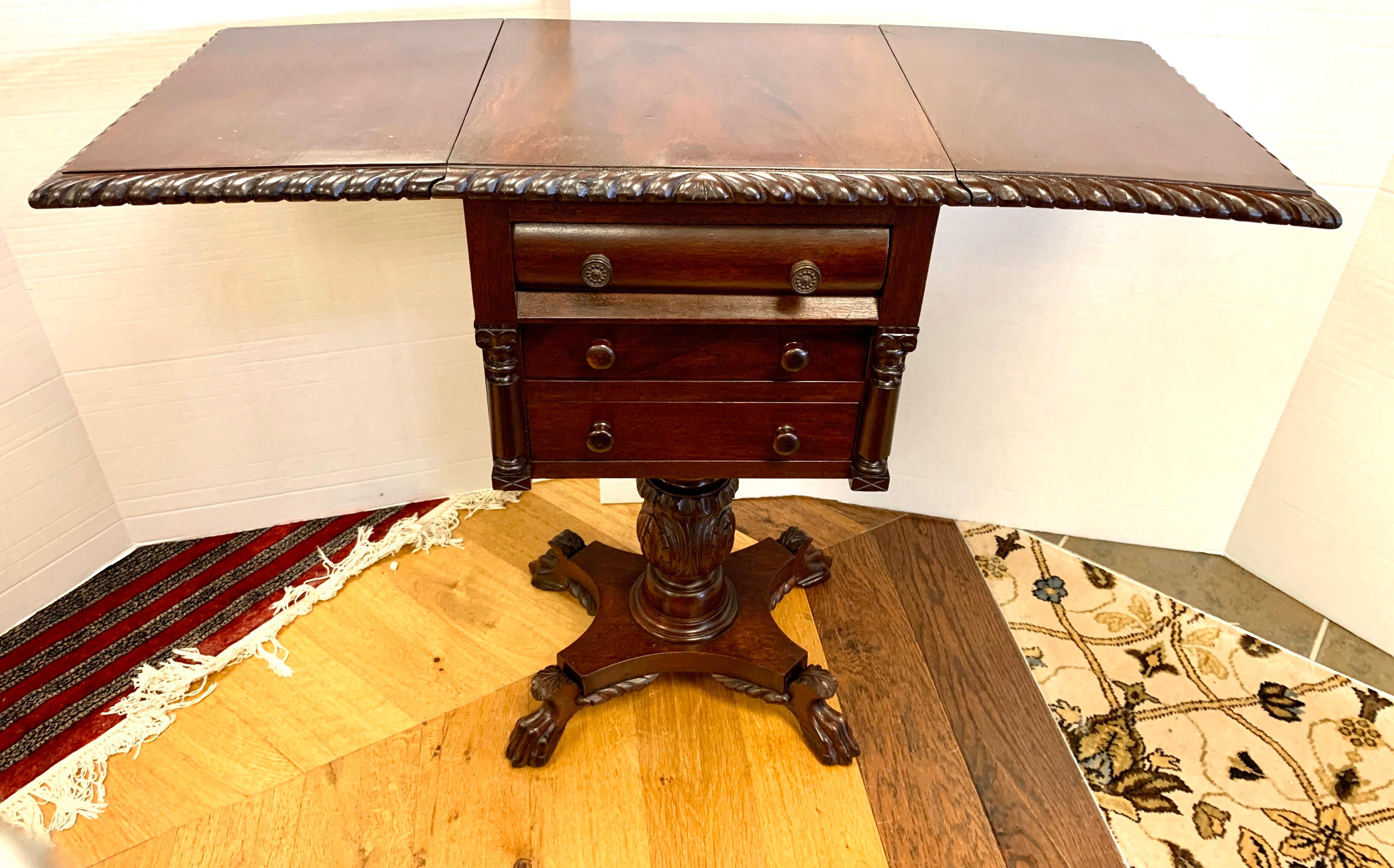 antique drop leaf pedestal table