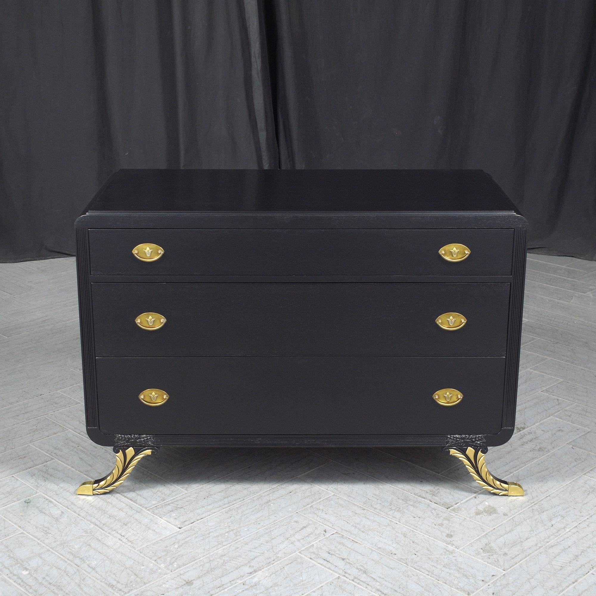 Immerse yourself in the timeless elegance of our antique empire dresser, a masterpiece of craftsmanship and style brought back to life by our skilled artisans. Crafted from rich mahogany, this chest of drawers now boasts a striking ebonized color, a