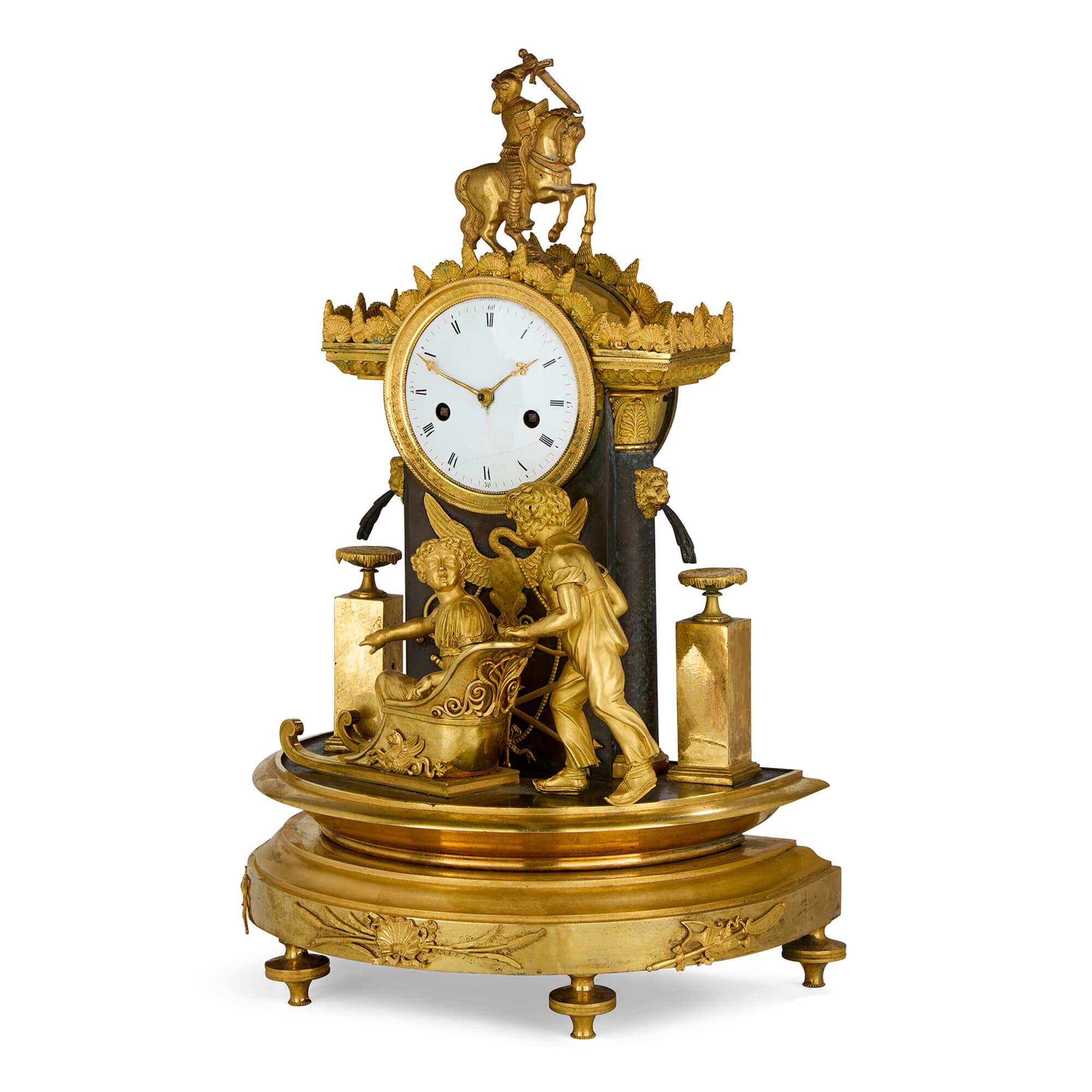 Antique Empire Gold Gilt Patinated Bronze Ormolu Mantel Clock 
French, c. 1810
Height 48cm, width 31cm, depth 20cm

A superb example of early 19th-century French decorative arts, this antique mantel clock exemplifies the grandeur of the Empire