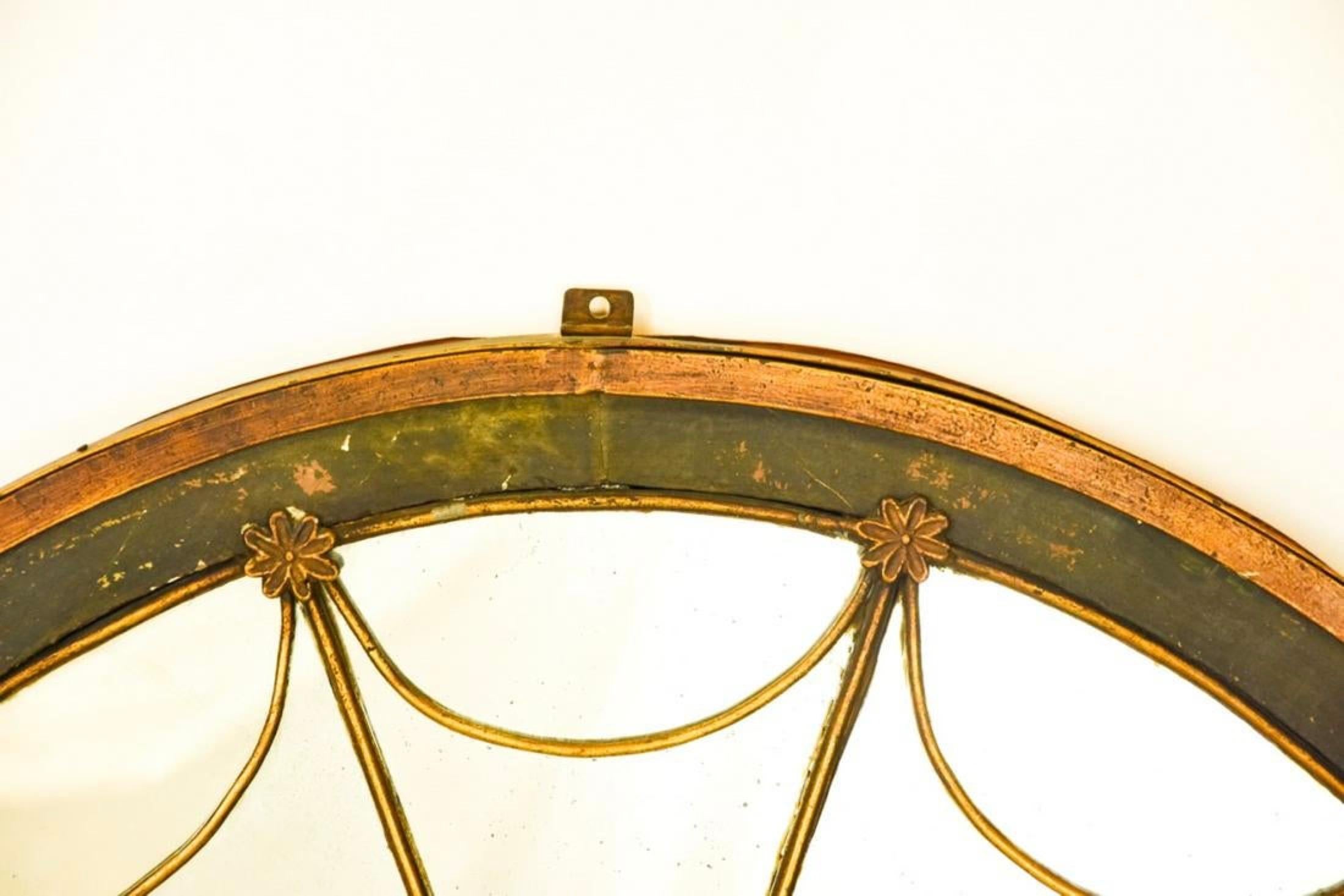 Rare stylish antique Empire style gilded iron frame mantle mirror with arched top and paned detail. Great as mantel mirrors, fireplace mirror, console mirror, or trumeau mirror. Iron frame lends itself for indoor or outdoor use.  Add style and