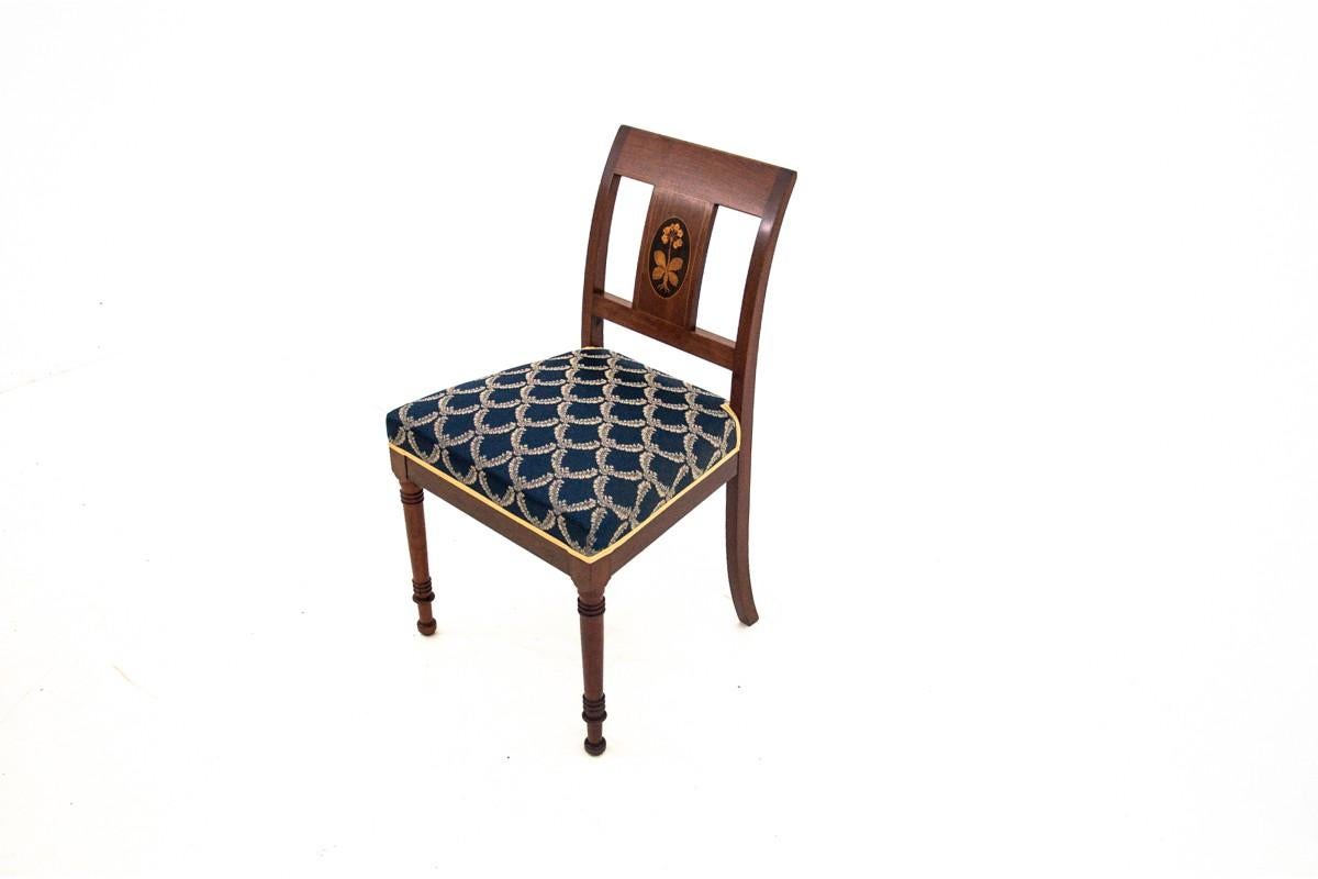 A set of chairs in the style of Empire, made of mahogany. The chairs have been renovated and upholstered in new navy blue fabric.

Dimensions:

Height 84 cm

High seat 46cm

Width 48

Depth 42.