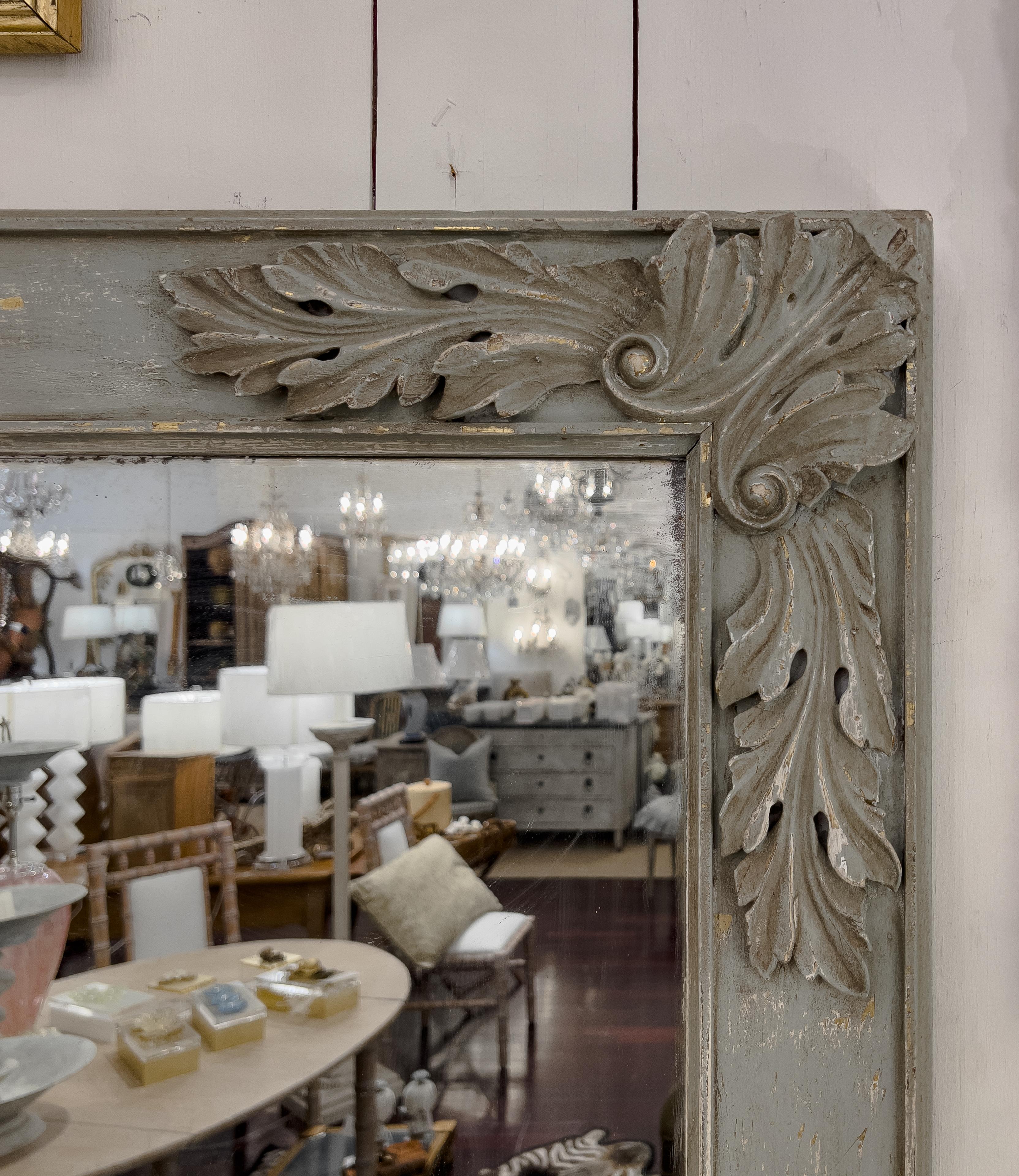 Antique rectangular French Empire style Painted Mirror with carved acanthus leaf and rosette detail on the frame. This piece is suitable to hang horizontally or vertically.