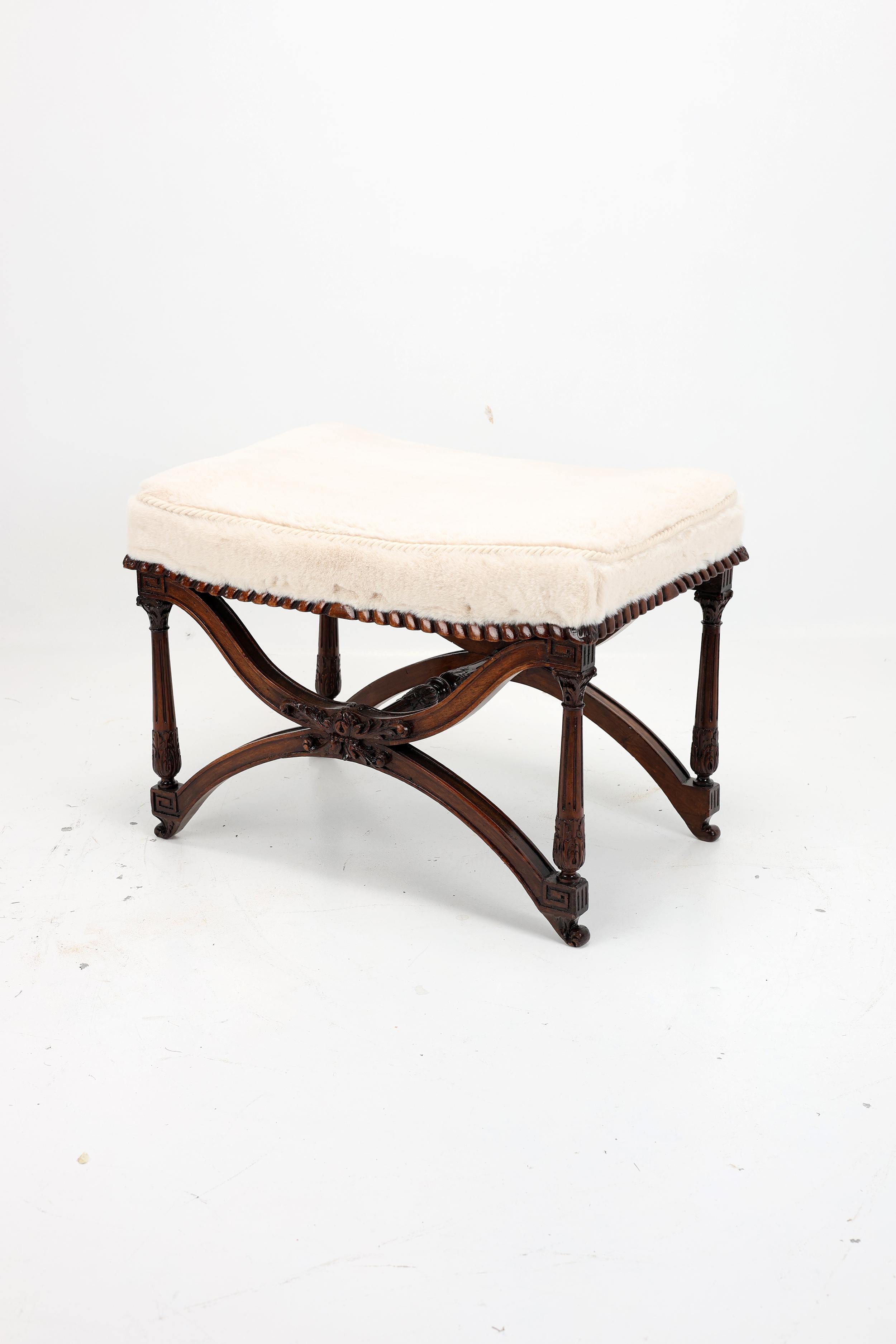 Antique Empire-Style Stool in Carved Wood,
France,  XIX century


An elegant and finely crafted stool from the French Empire period, dating to the early 19th century. The frame is made of solid wood likely mahogany or walnut and displays superb