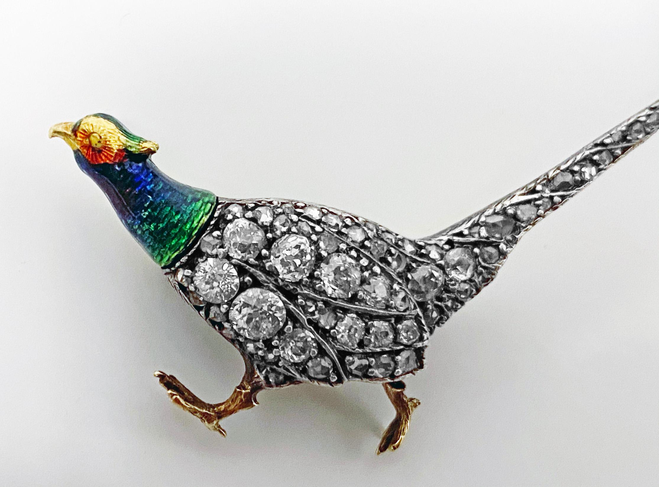 Antique Enamel and Diamond Pheasant Brooch, English C.1880. The body and tail encrusted with numerous old mine, european and rose cut diamonds. The head with striking green, blue, orange, gold and tones of mauve enamel. All set in gold on cut down