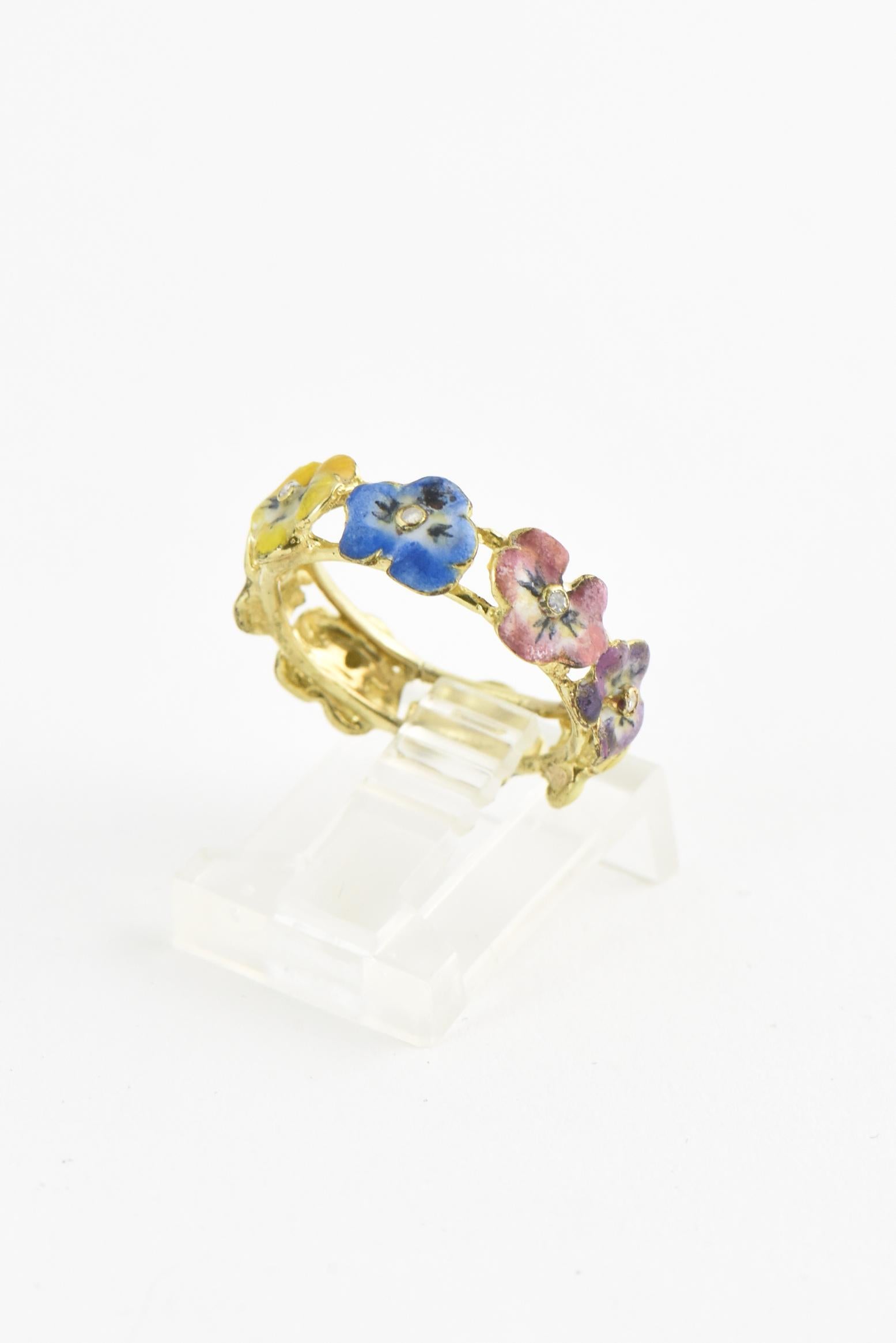 Victorian hand-painted enamel pansy ring with diamond centers and 14K yellow gold band. US size 5.5; cannot be sized. Enamel is fragile and can chip; keep away from chemicals. Age wear.