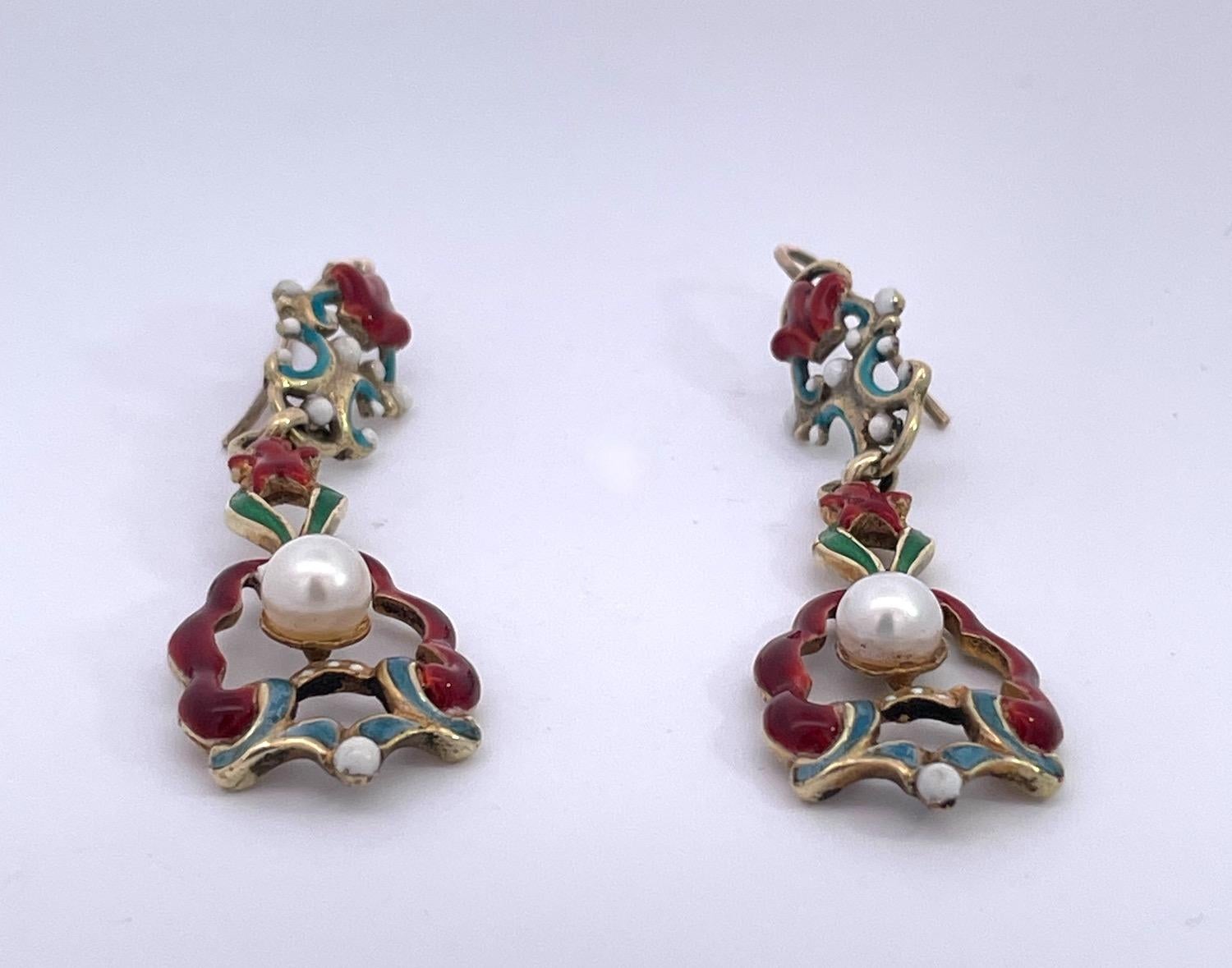 These Antique Enamel and Pearl earrings are from the 1930's and are pretty special.  First off there is little to no enamel loss for this time period that is amazing.  There are no repairs and this works so well with any of your enamel jewelry. 