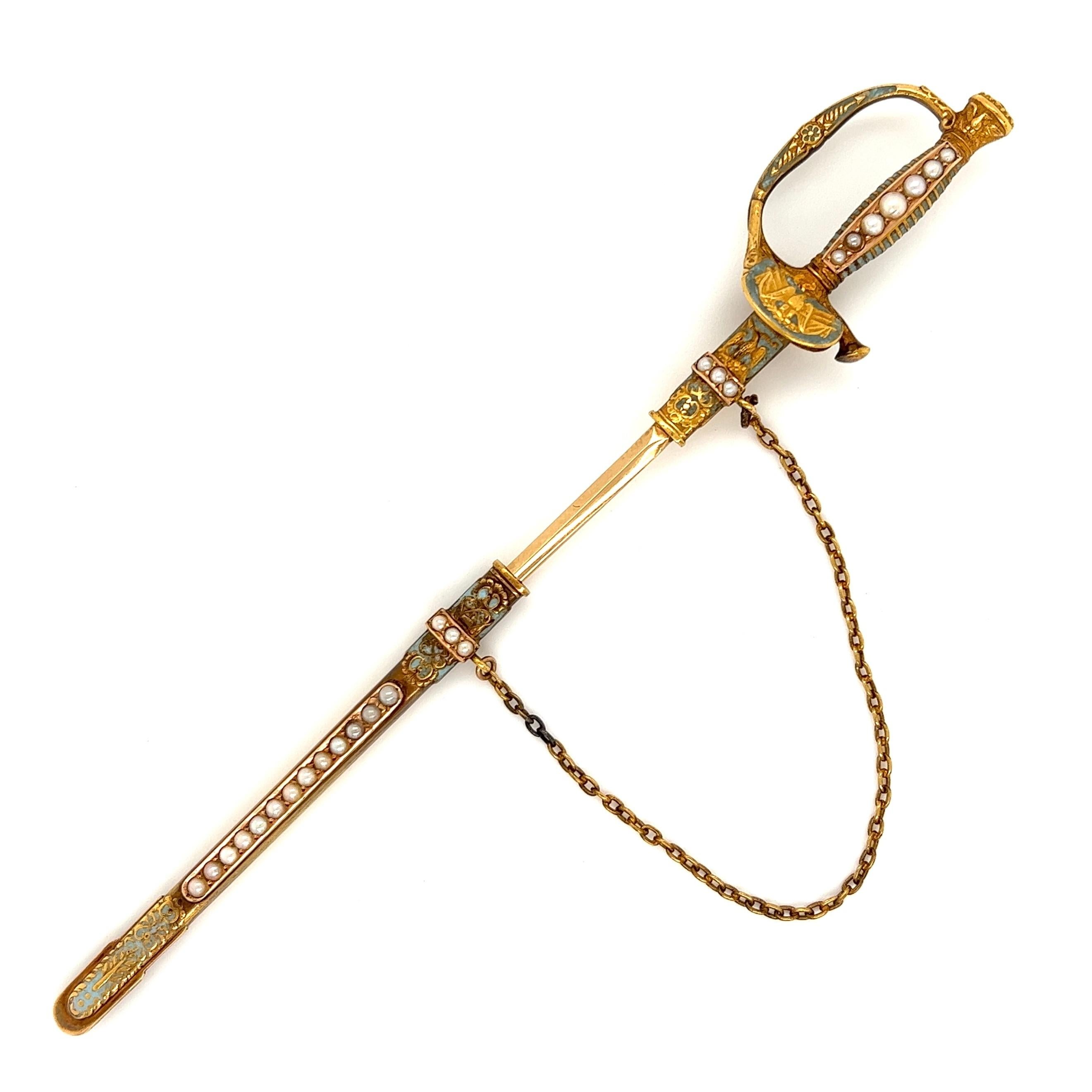 Awesome Antique Victorian Enamel and Seed Pearls Sword 14K Yellow Gold Jabot Pin. Beautifully Hand crafted in 14K yellow Gold. Measuring approx. size 5” Long. More Beautiful in real time! For that Special Someone…including You! 

