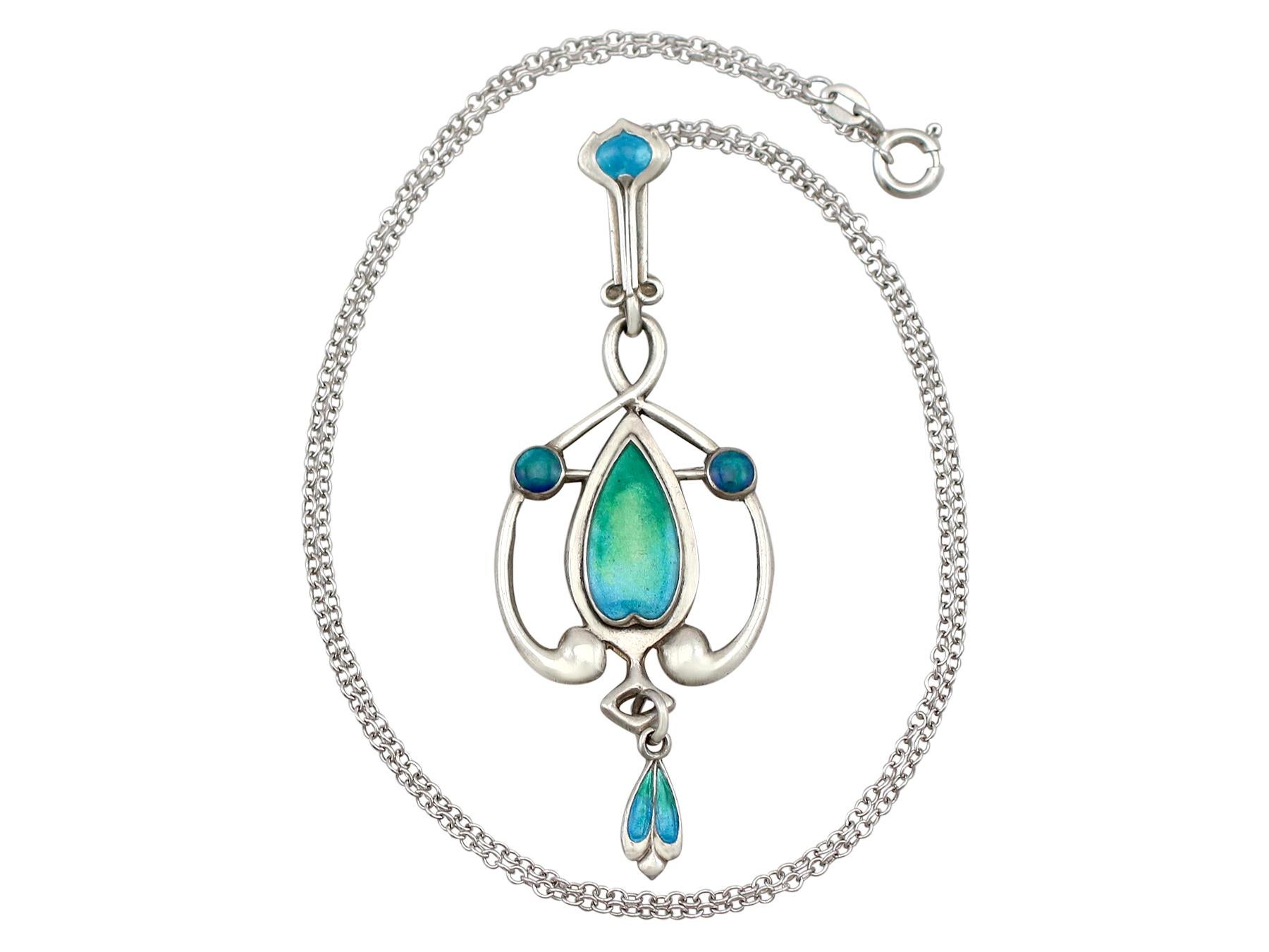 An impressive antique Art Nouveau sterling silver and enamel pendant and chain; part of our diverse antique jewellery and estate jewelry collections.

This fine and impressive Art Nouveau pendant has been crafted in sterling silver.

The pendant has