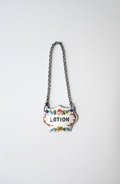 Antique Enamel Bottle Tag