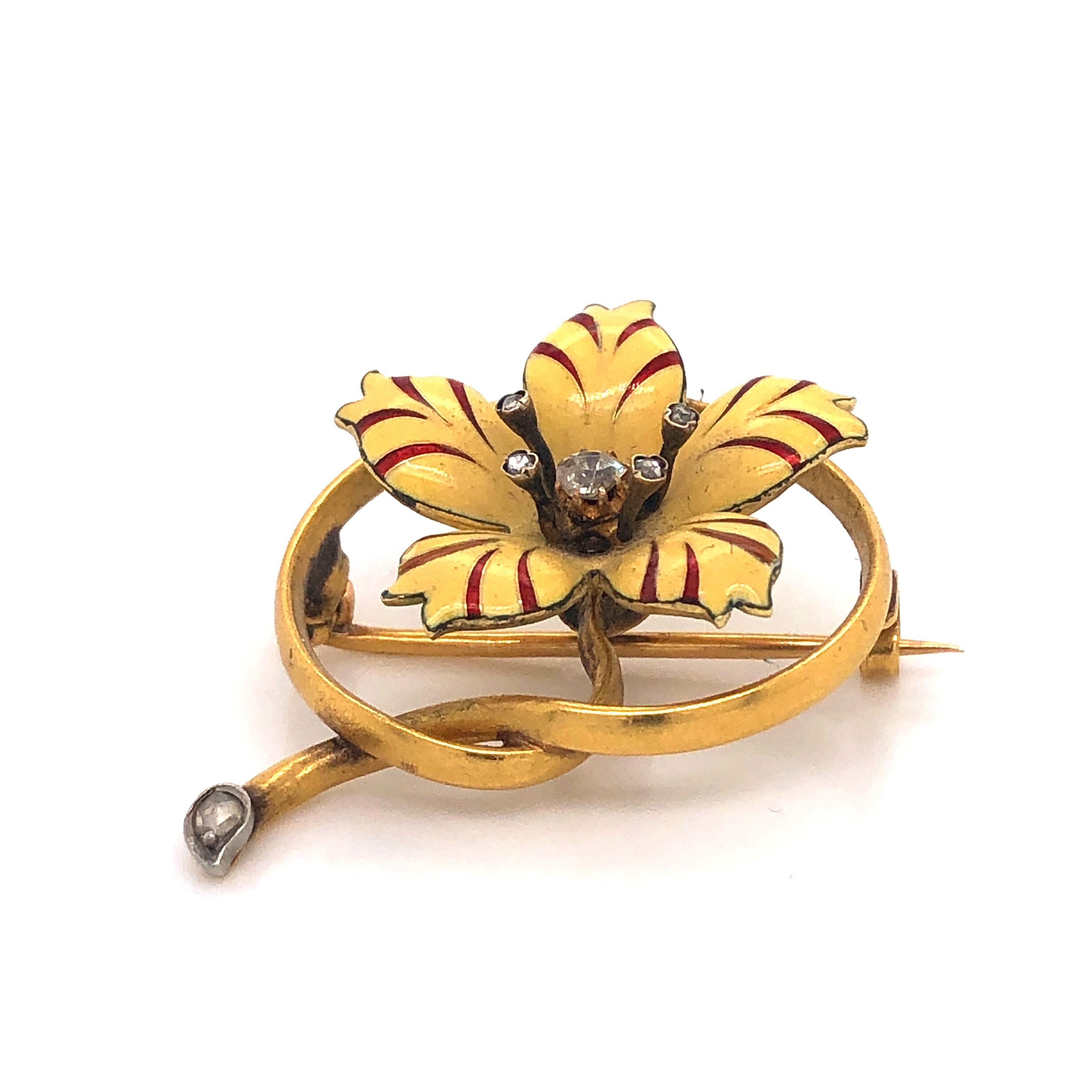 A Victorian enamel, diamond and gold flower brooch, with five cream and red striped enamelled petals, with an old-cut diamond in the centre and rose-cut diamond set stamens. The gold stem forms a knotted loop around the flower, with a rose-cut