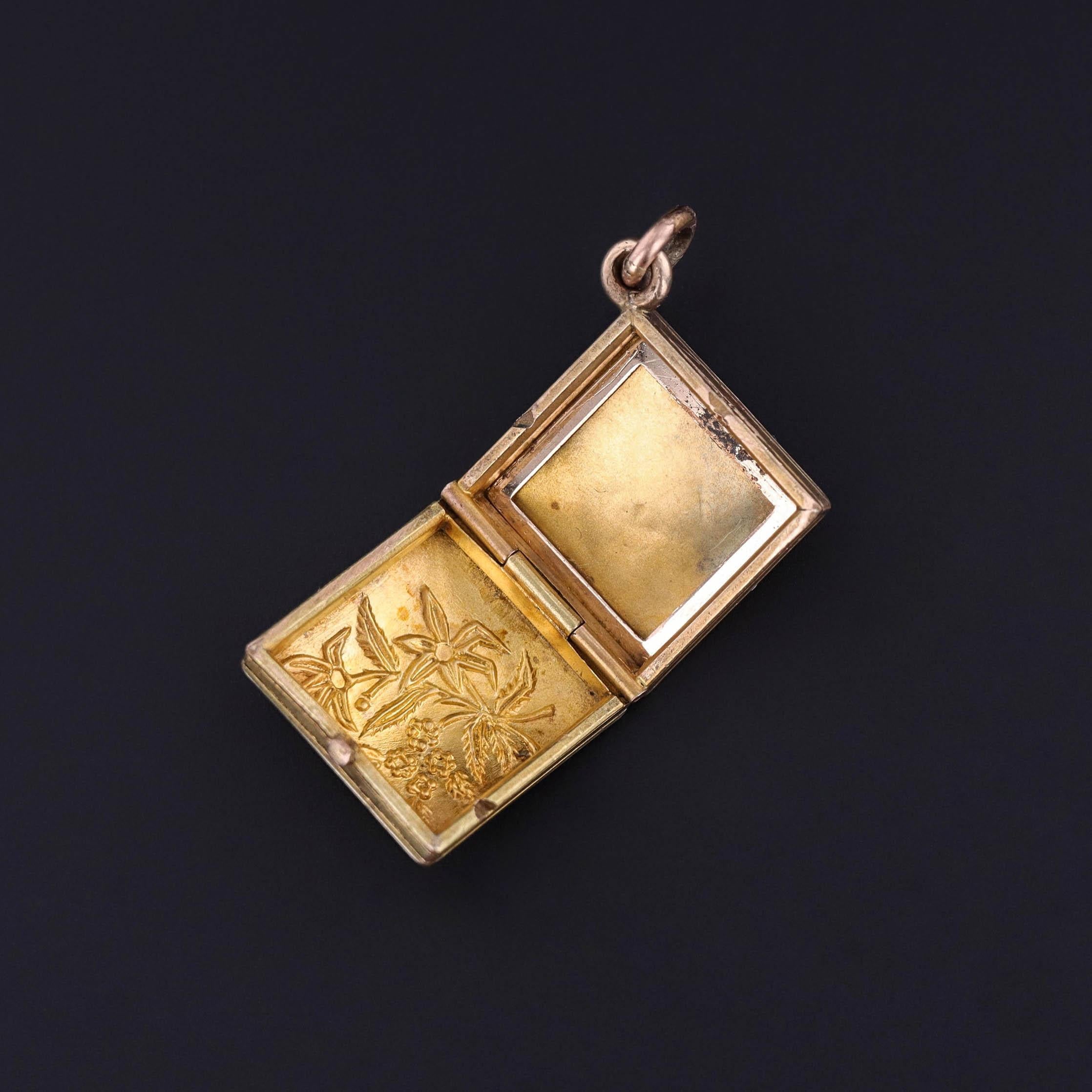 Antique Floral Enamel Locket in 12k Gold (c. 1920)

This charming antique locket from around 1920 is a lovely example of early 20th-century craftsmanship, featuring hand-painted enamel flowers set against a backdrop of 12k gold. The floral motif is