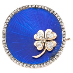 Antique enamelled gold brooch with diamond cloverleaf
