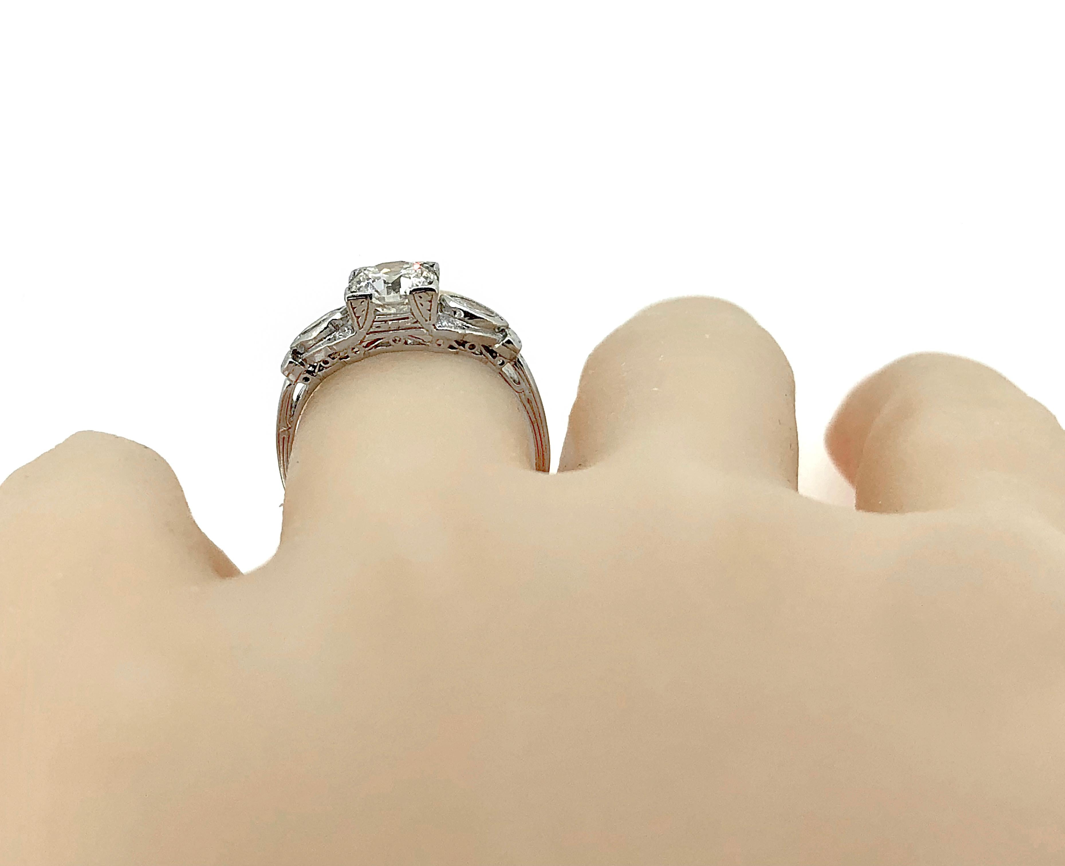 Women's Antique Engagement Ring .91 Carat Diamond and Platinum Art Deco For Sale