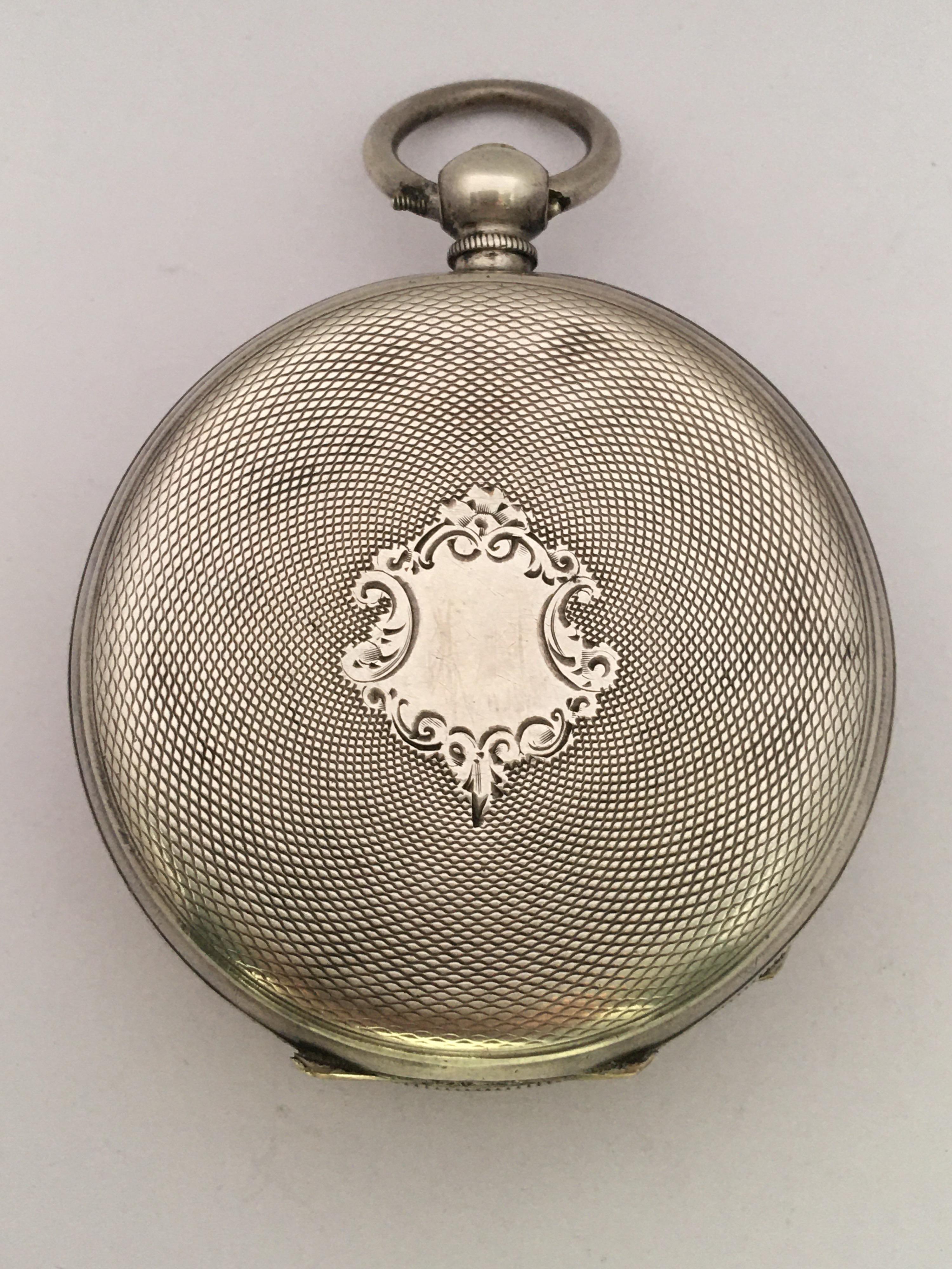 This beautiful antique 51mm diameter (excluding crown) Silver Pocket watch is in good working condition and it is ticking nicely. It is recently been serviced and it runs well. Visible signs of ageing and wear with light tiny scratches on the glass
