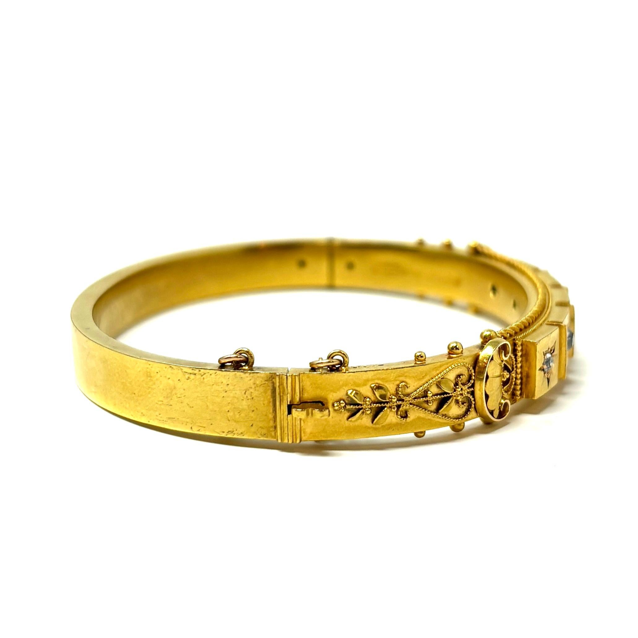 A lovely 19th century Etruscan Revival bangle set with old mine cut diamonds, this piece can be worn everyday- alone, or stacked with your other favorite pieces. 

Approximately .62 ct tw old mine cut diamonds.

3/5