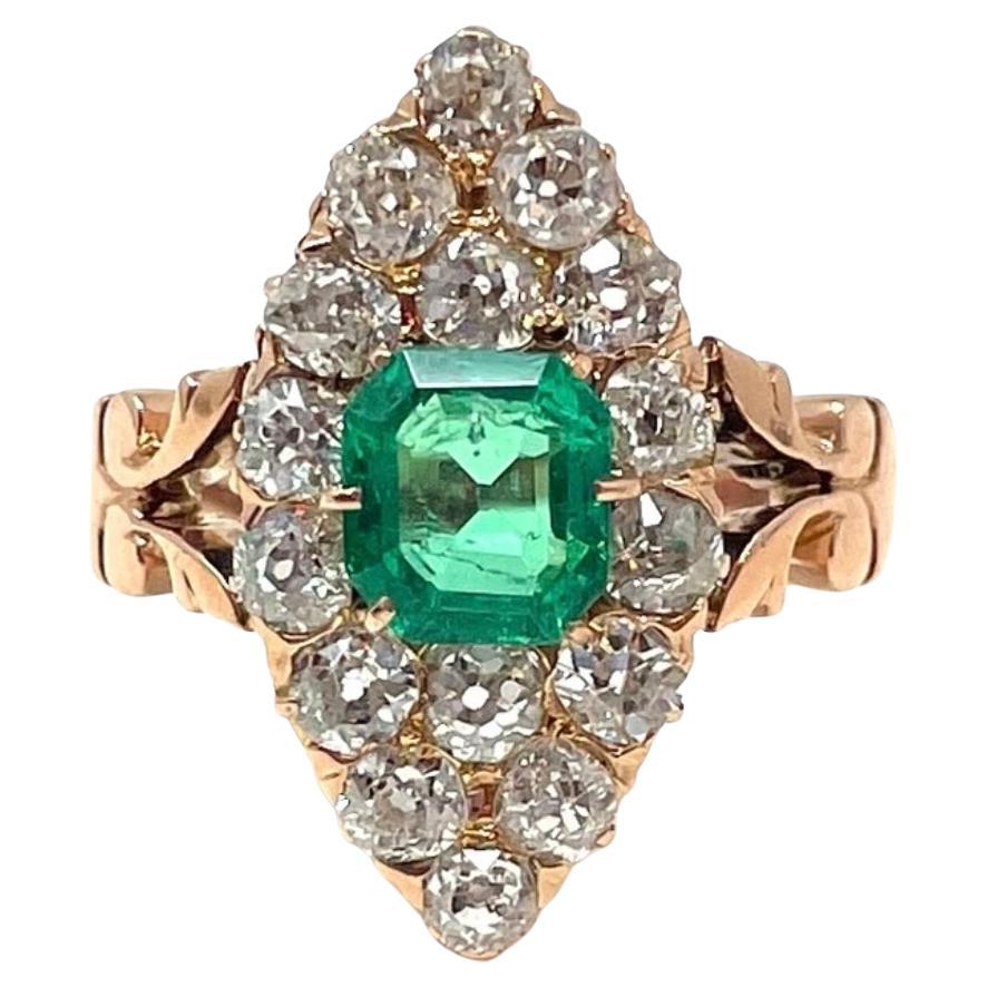 Antique English 15 Carat Gold Old Mine Cut Diamond and Emerald Navette Ring