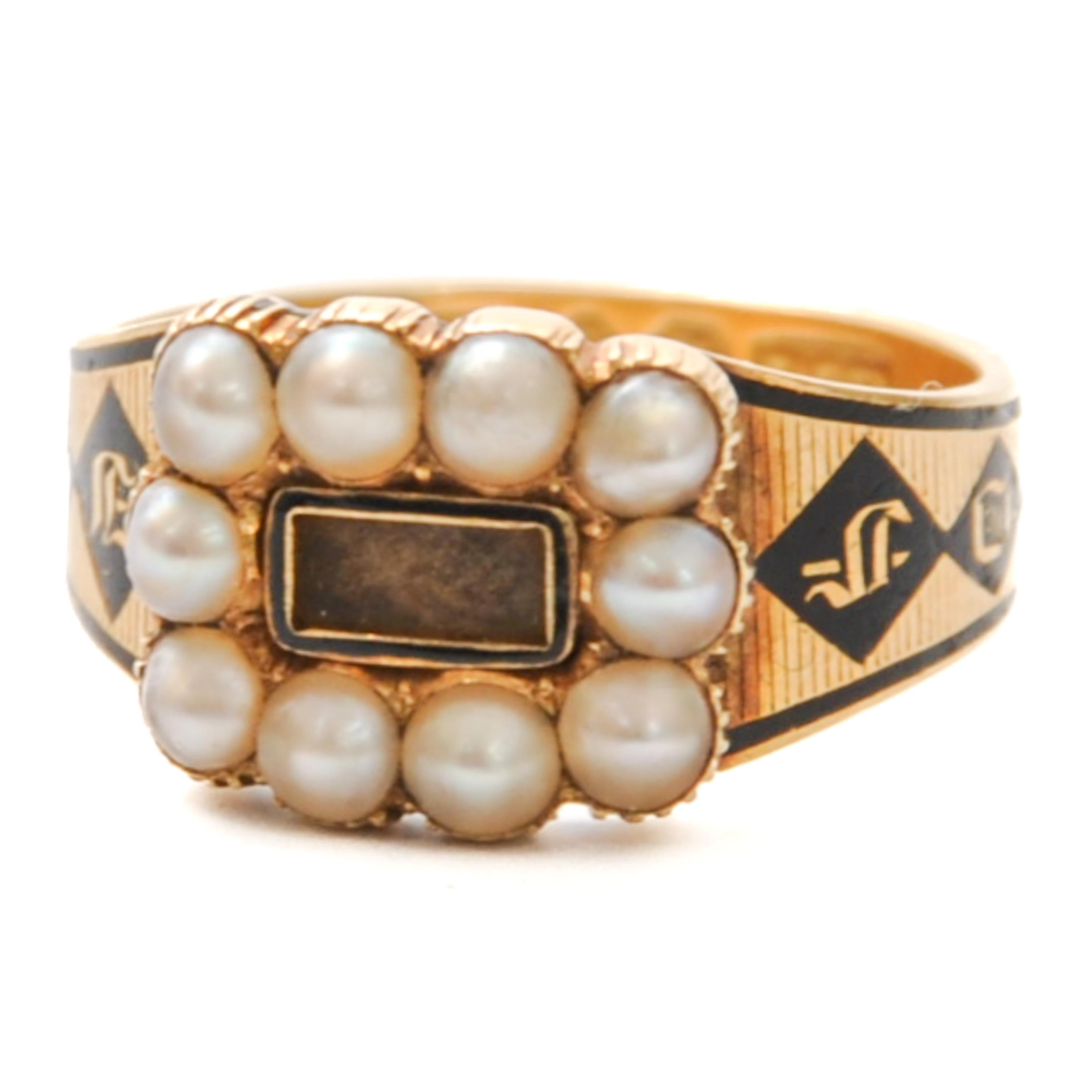 An exquisite relic of the past, this antique 18K gold memorial ring from 1831 with pearls and black enamel is a testament to the elegance and sentimentality of bygone eras. Crafted with meticulous care and attention to detail, this ring exudes both