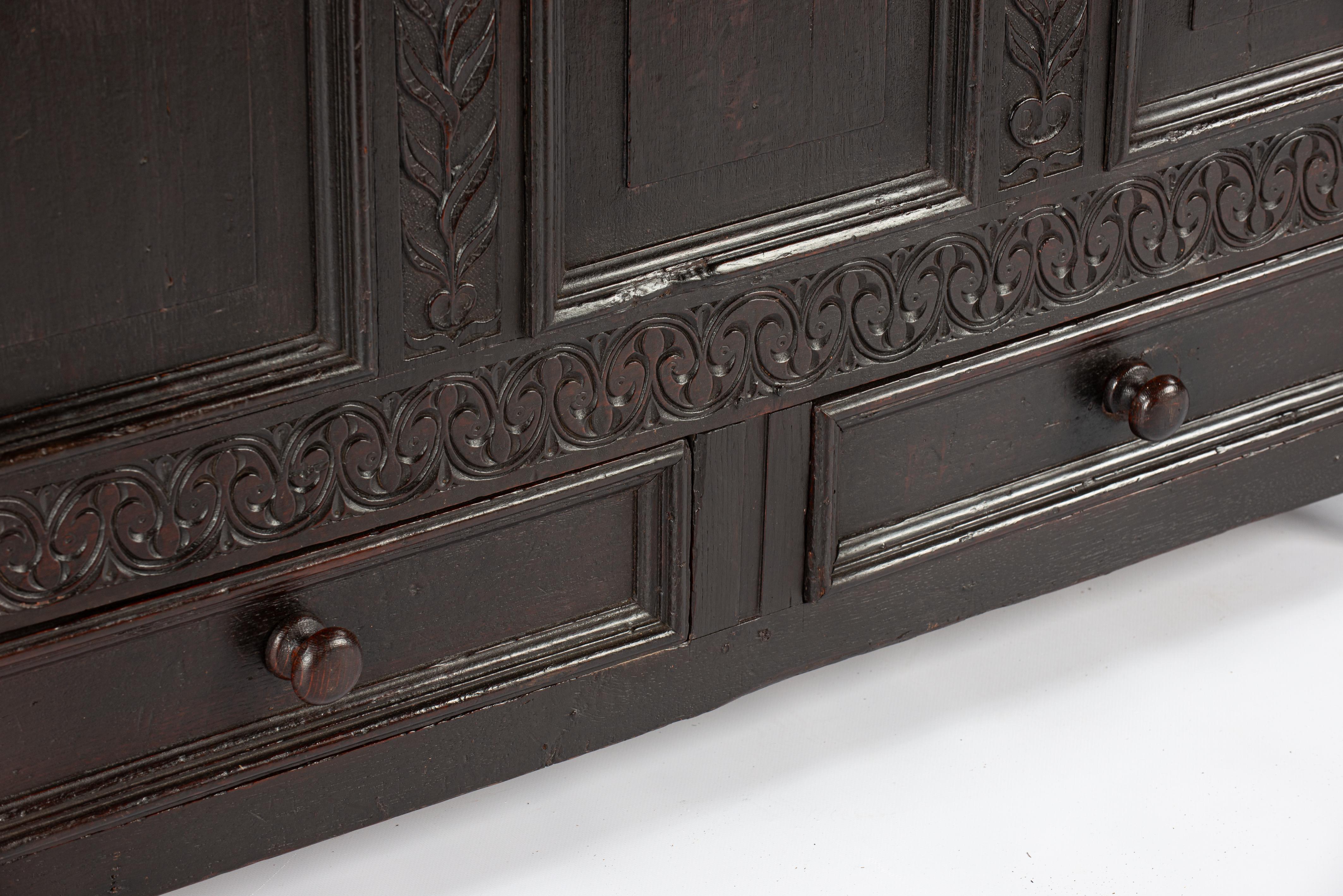 Antique english 18th century blacked or dark brown solid oak carved chest  trunk For Sale 11