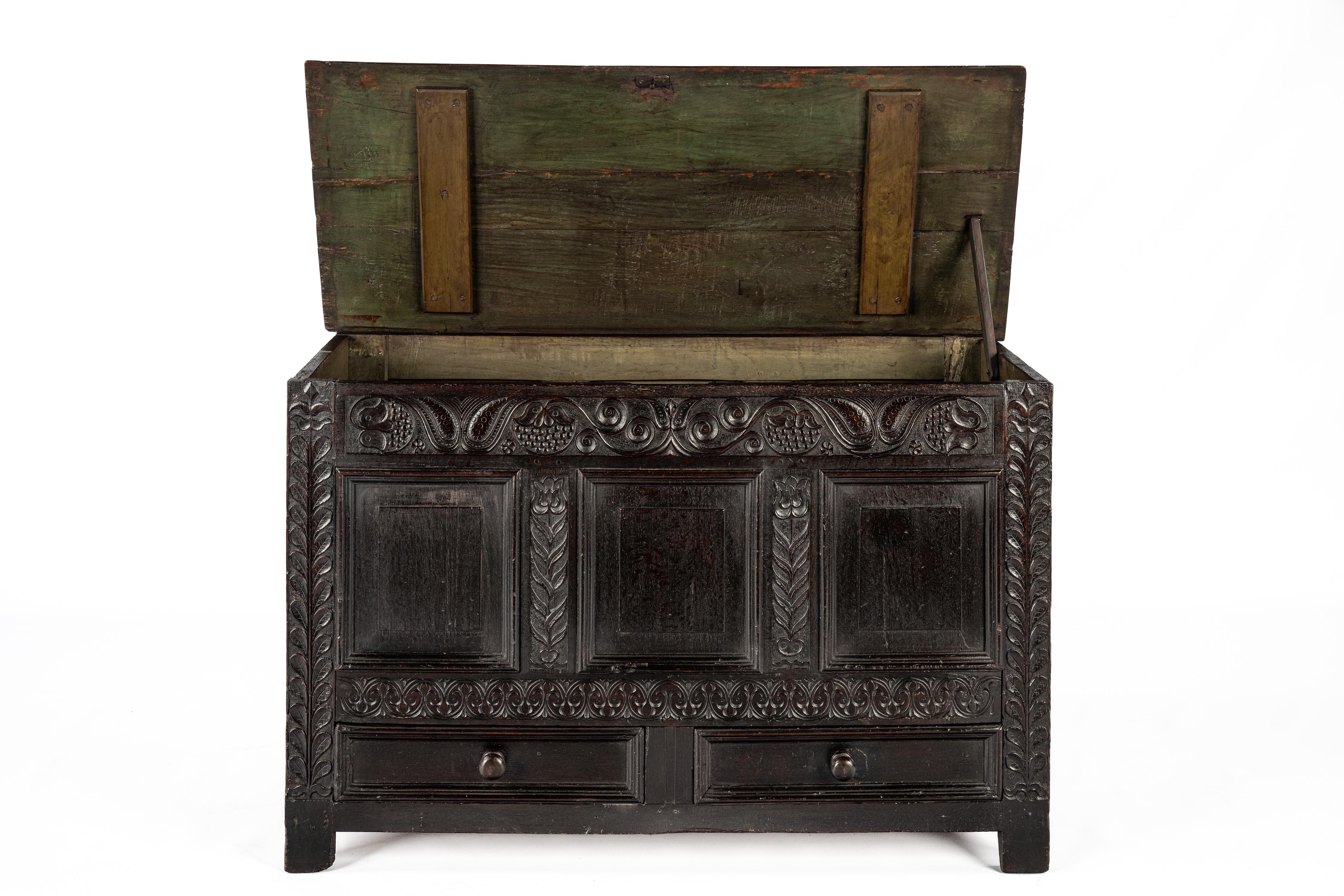 English Antique english 18th century blacked or dark brown solid oak carved chest  trunk For Sale