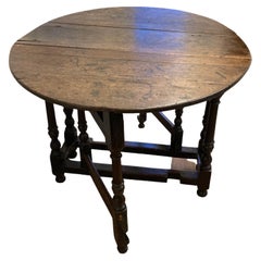 Ancienne table à abattant en chêne du 18e siècle à pieds en treillis