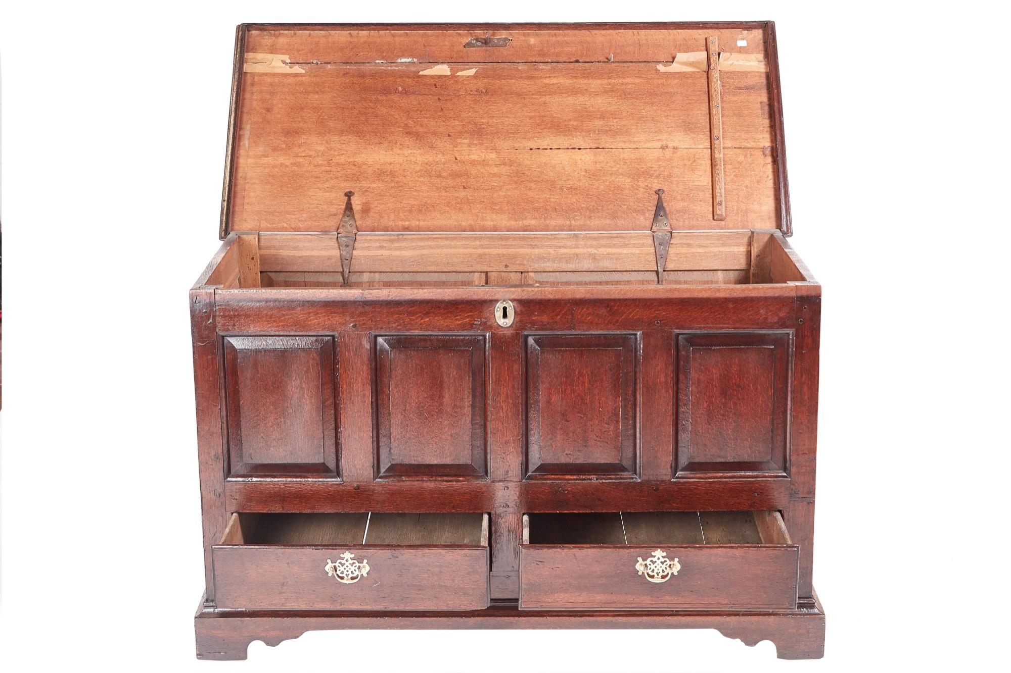 This is an English 18th century antique oak mule chest which has a lift up lid and four lovely panels to the front two drawers. It stands on original bracket feet.

Wonderful original condition.

   