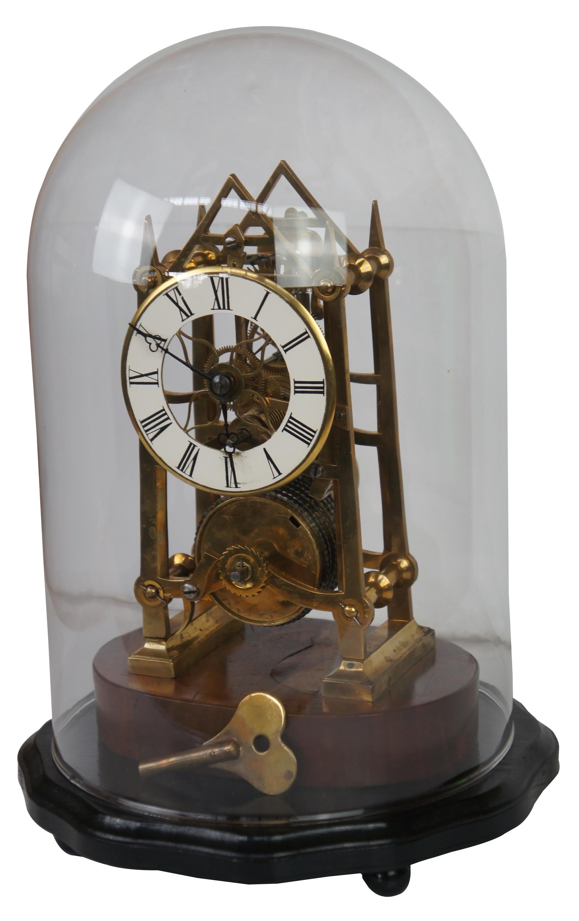 clock in a glass dome