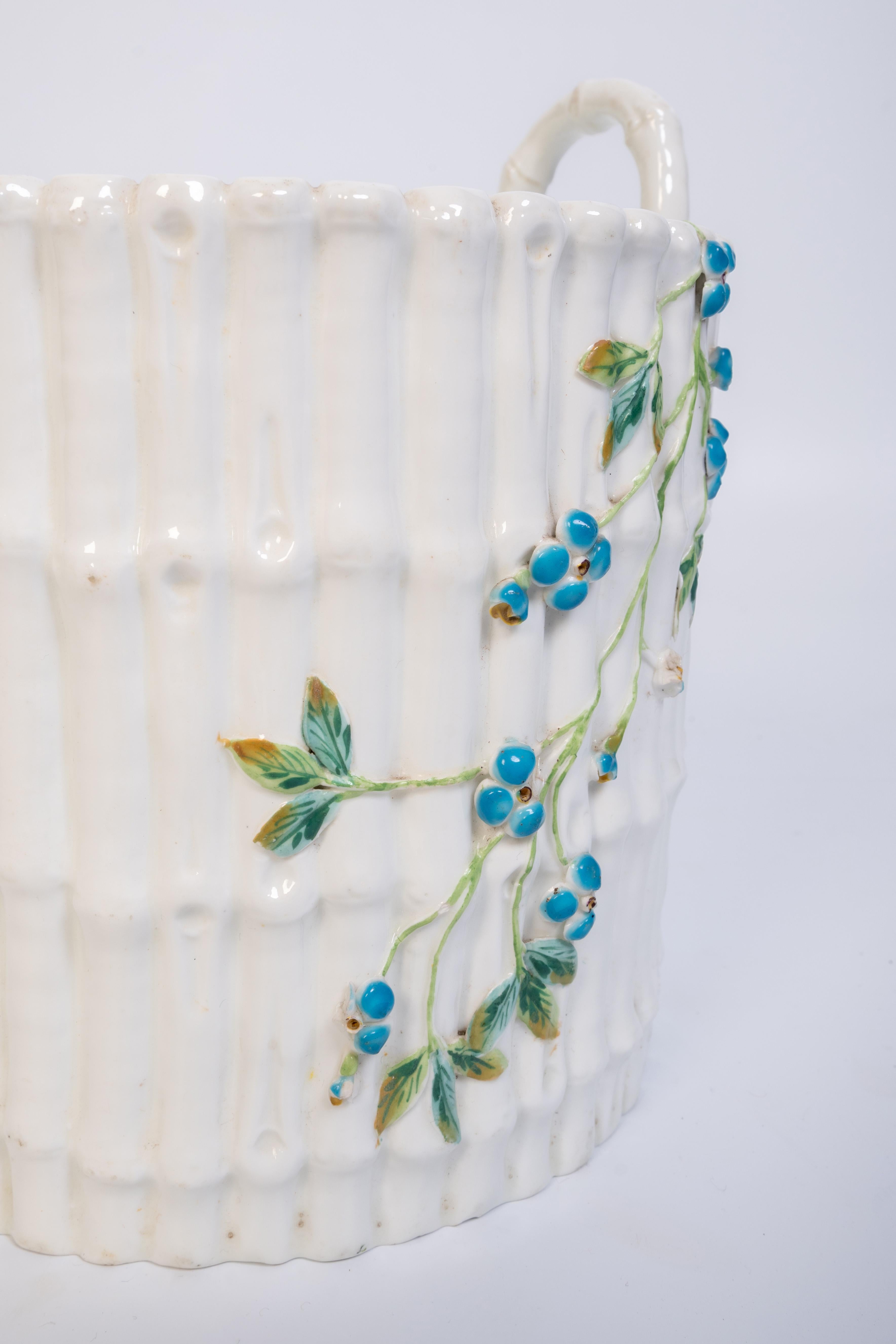 Antique English 19th Century Faux Bamboo Porcelain Plant Pot

In very good condition, free from chips and cracks.