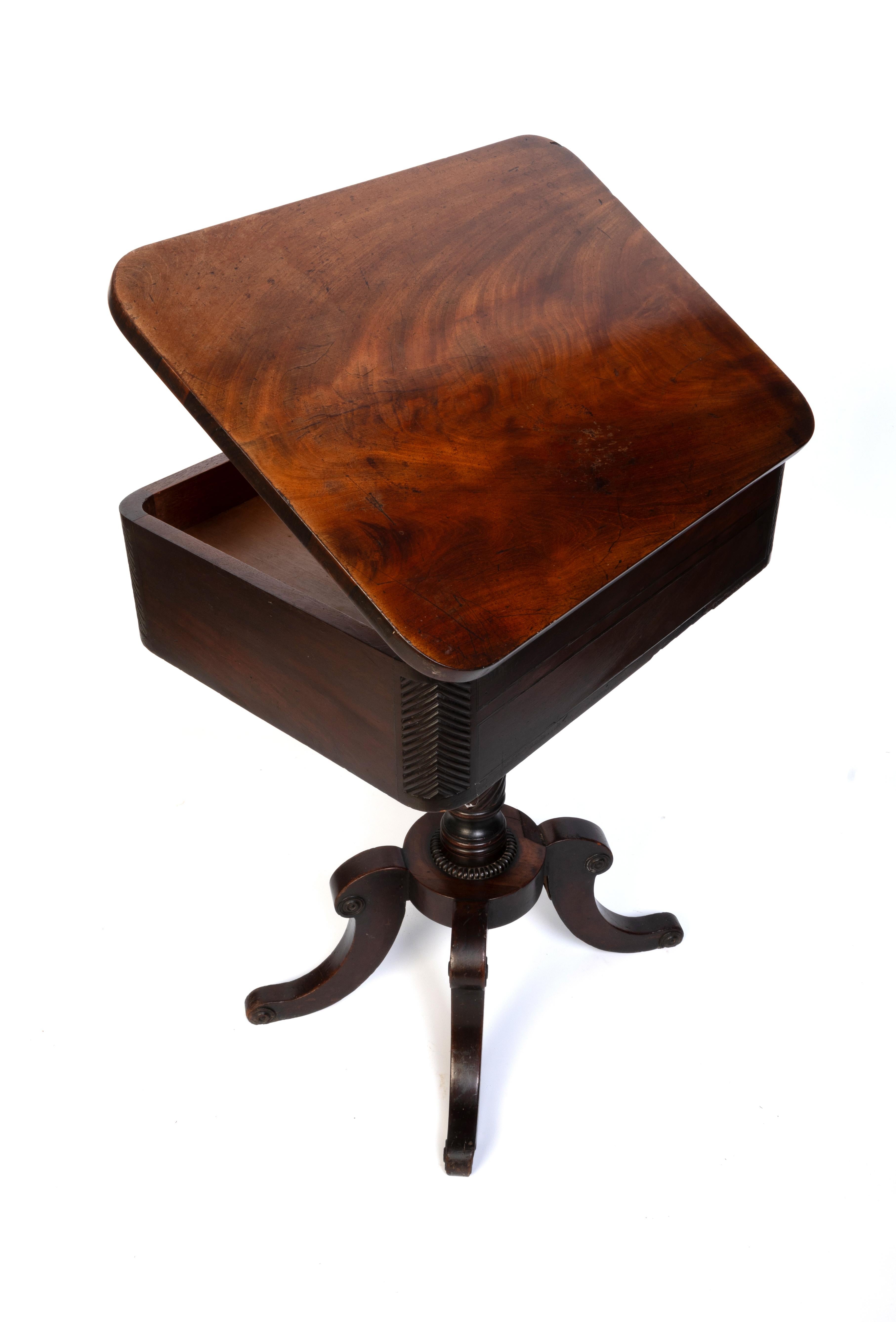 Antique English 19th Century Flamed Mahogany Lift Top Work Table With A Single Frieze Drawer.

Ideal as a side table or console.

In good overall condition commensurate of age. Some signs of wear and minor losses and historic repairs. 
