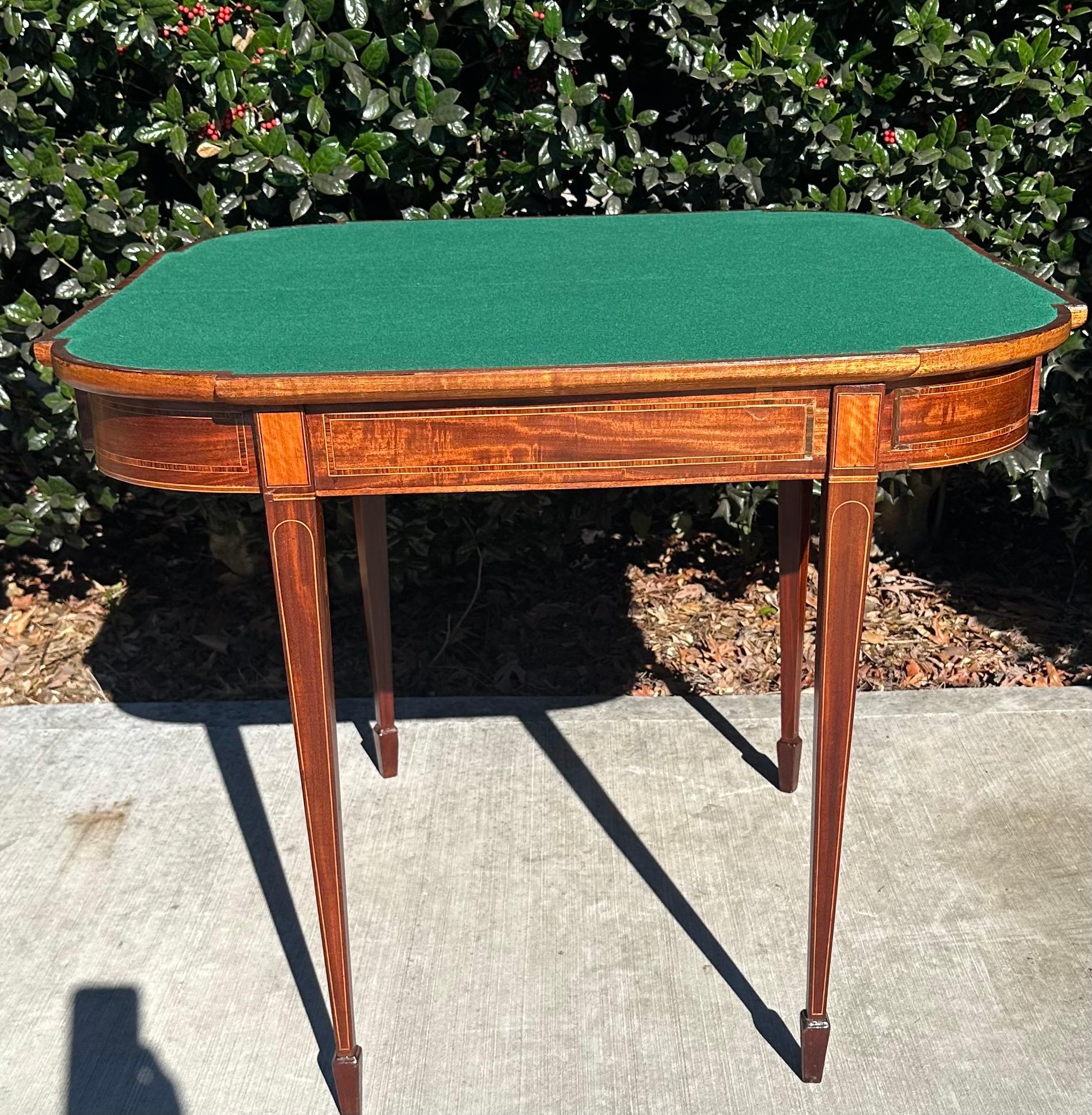 Antique 19th century English inlay card table. This piece is a work horse in that it could be a mahjong table or game table. It could also serve as a kids or luncheon table if you are hosting a crowd.  Beautiful inlay work along the top.  Newly