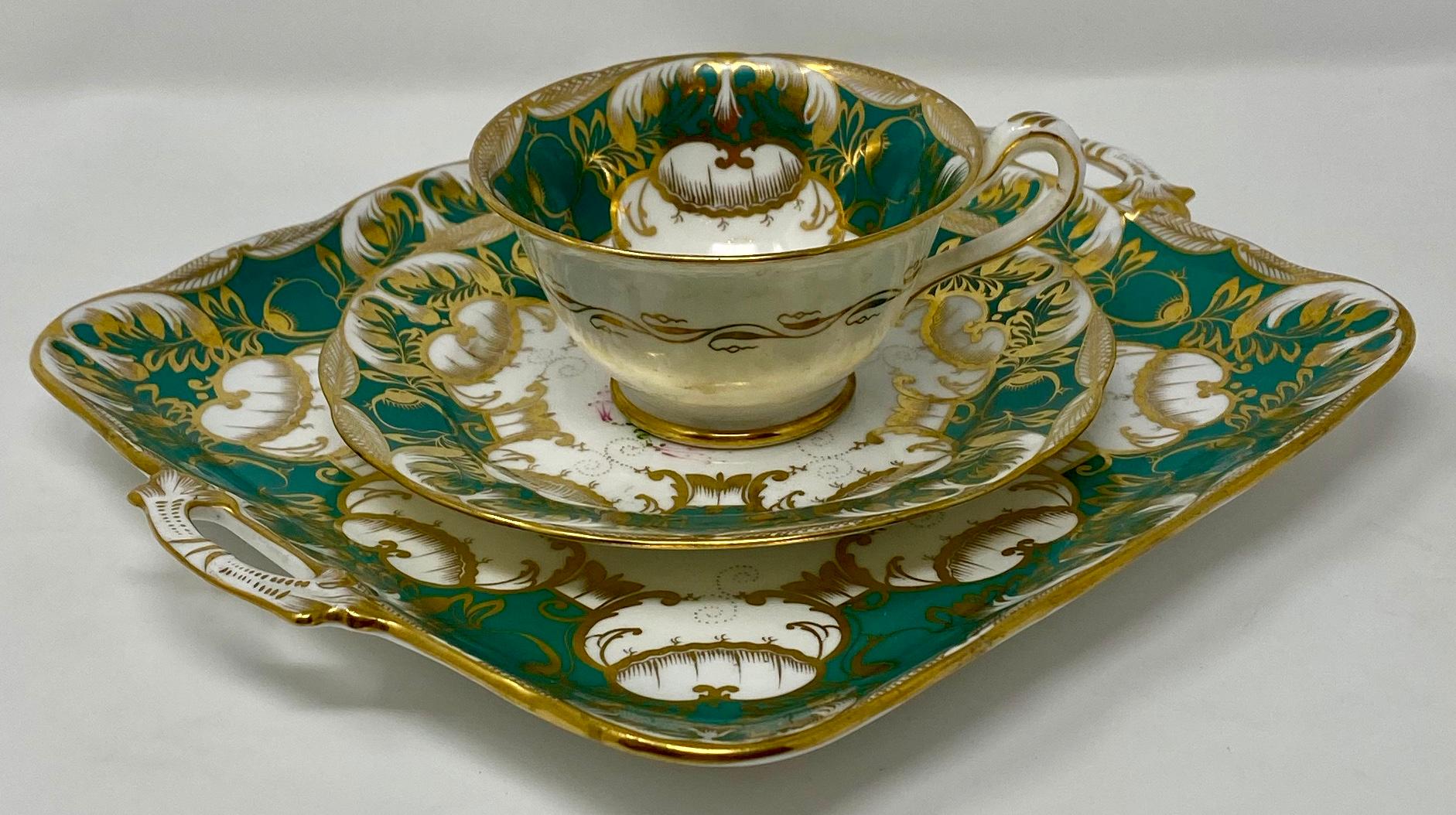 This lovely Antique English 19th century porcelain dessert and coffee set consists of 10 pieces. The coloring on the pieces has remained strong. The green is particularly lovely and different.


